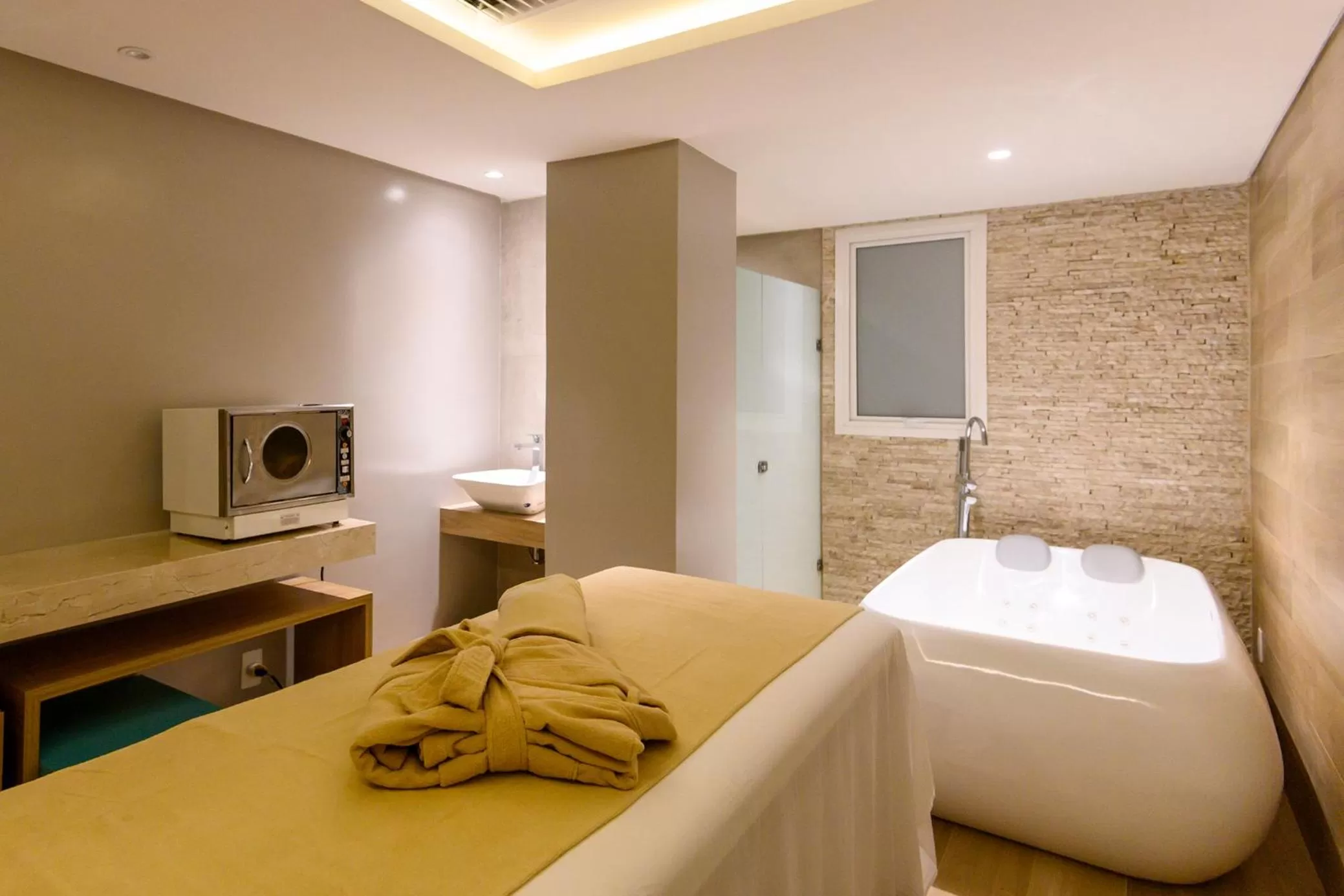 Bed in Vogal Luxury Beach Hotel & SPA