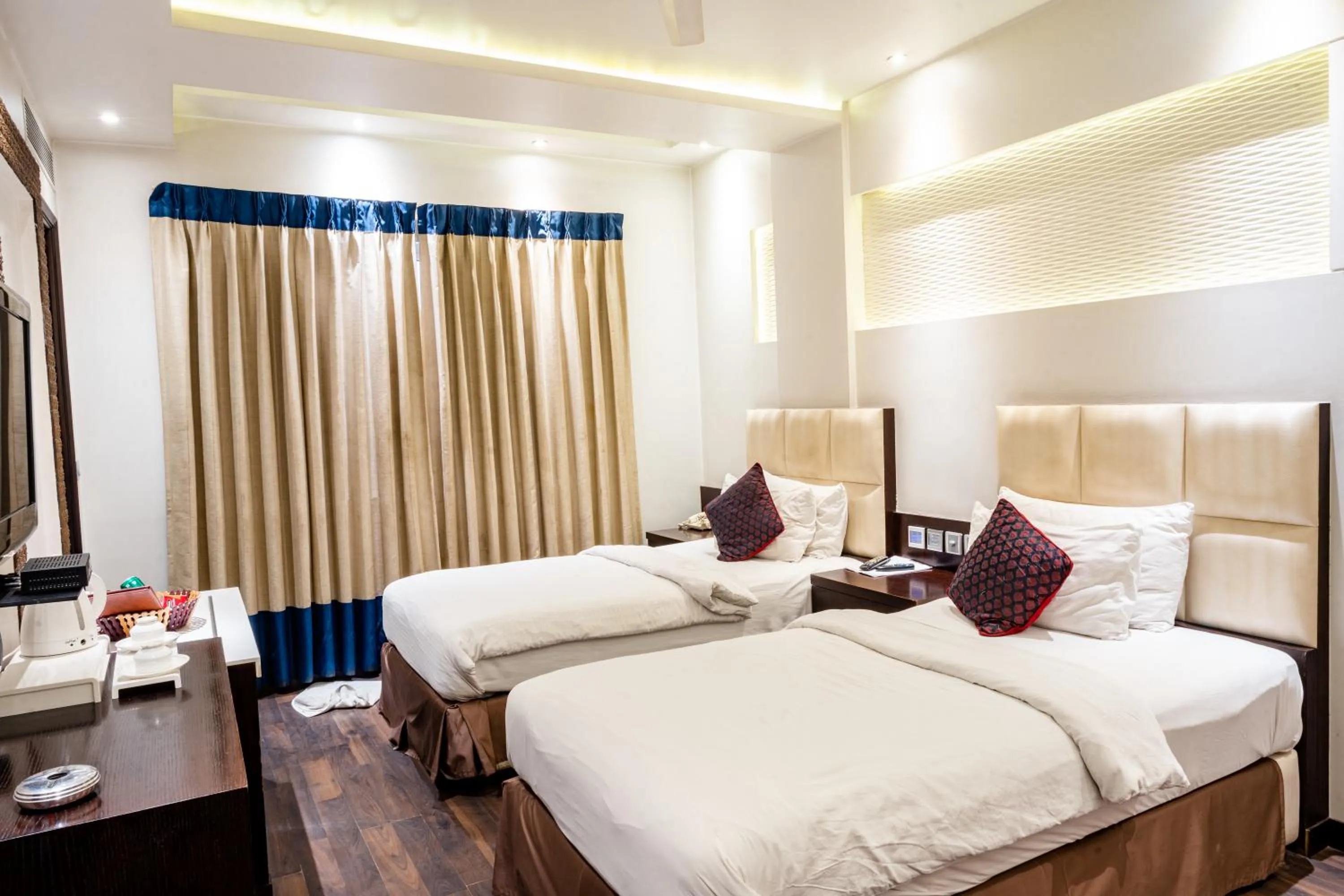 Photo of the whole room, Bed in Hotel Grand Godwin - Near New Delhi Railway Station - Paharganj