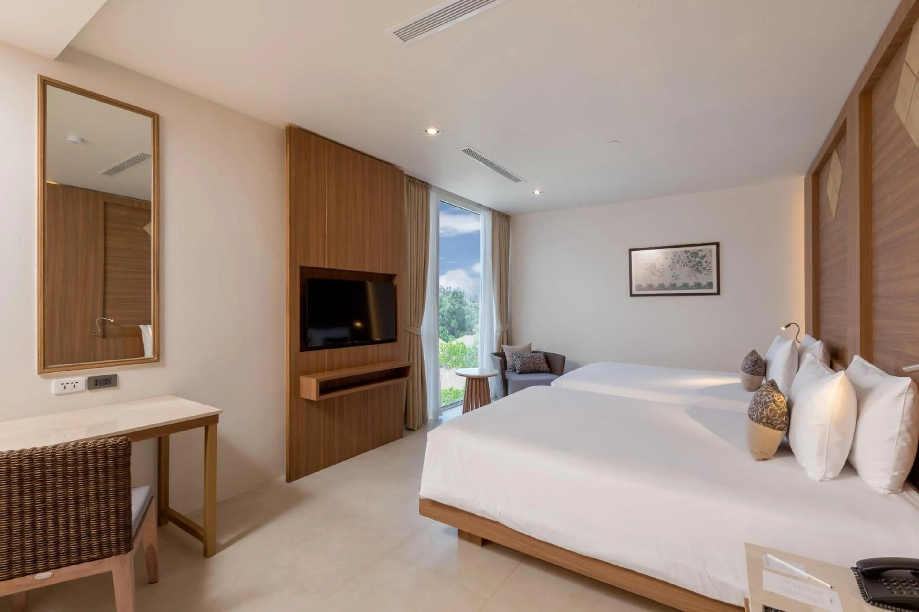 Bed in Splash Beach Resort Phuket Family-Friendly Water Park Resort Near Phuket Airport