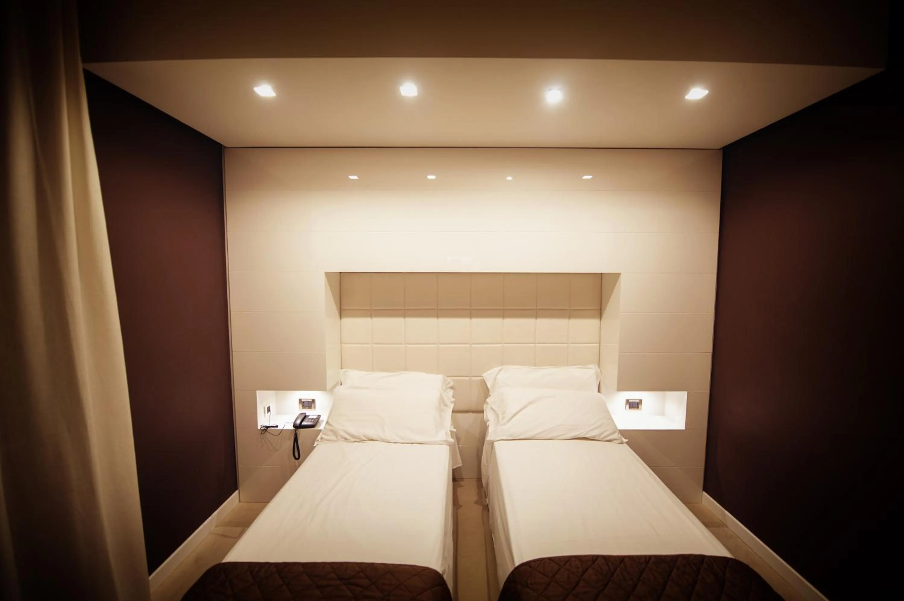 Bed in Gran Paradiso Hotel Spa