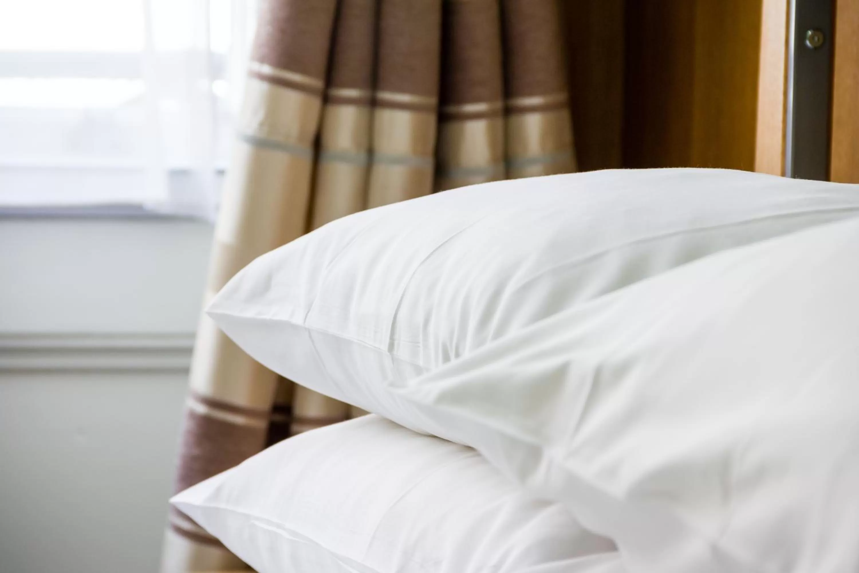 Bed in Gower House Hotel