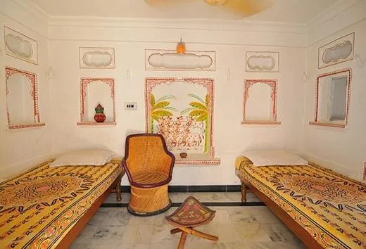 Photo of the whole room, Bed in Udai Haveli Guest House