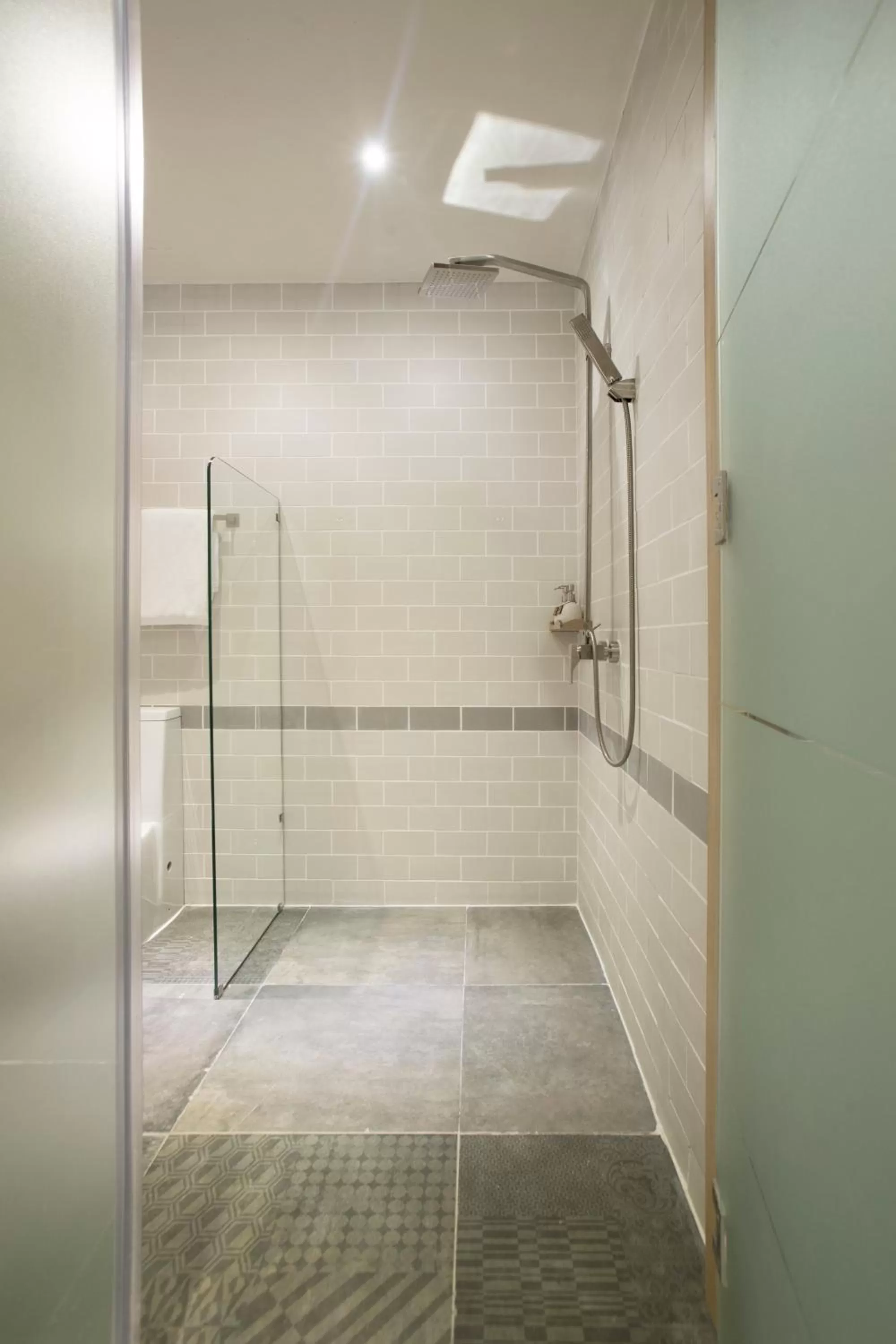 Shower in Fusion Suites Saigon