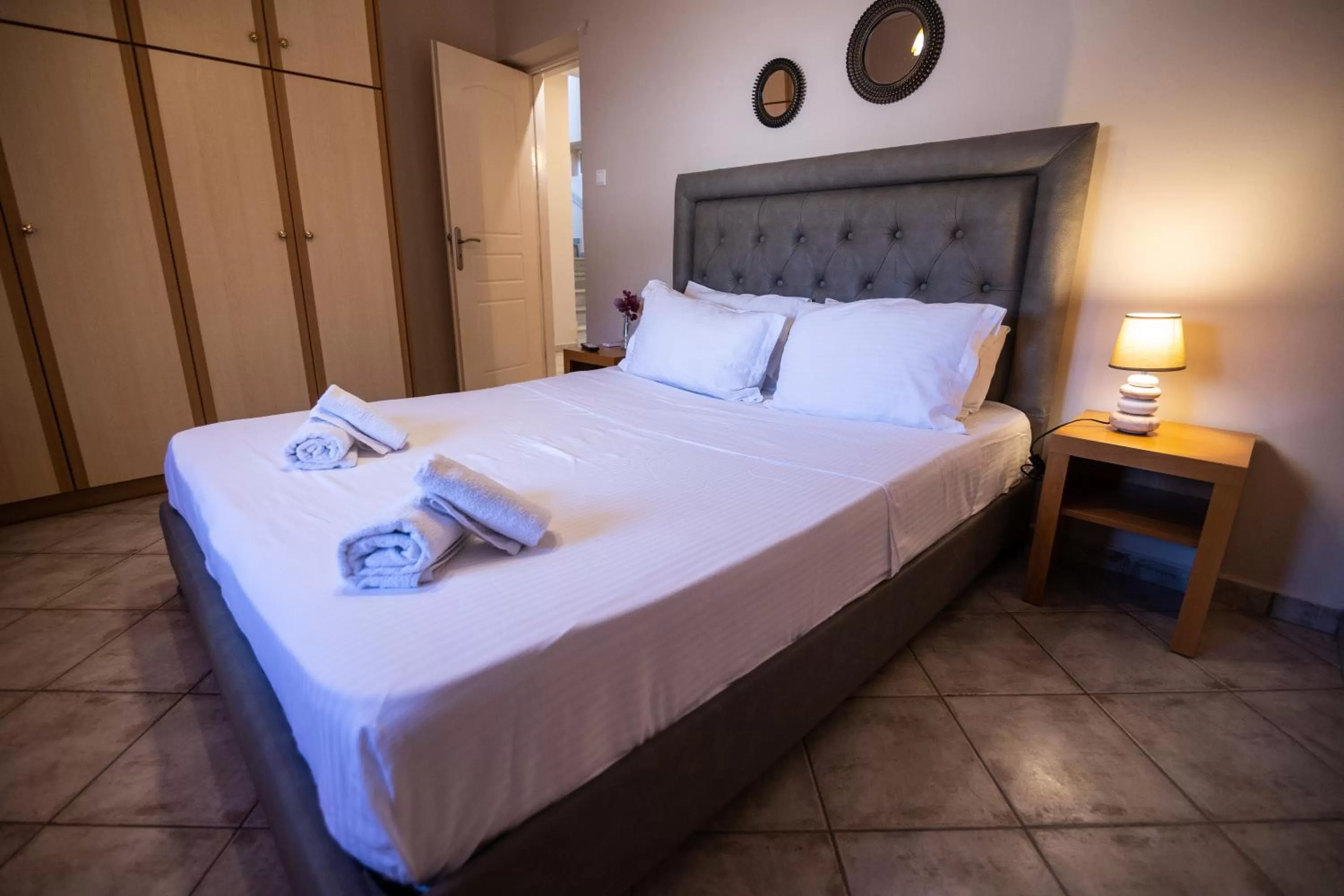 Bed in Votsalakia Hotel & Luxury Apartments