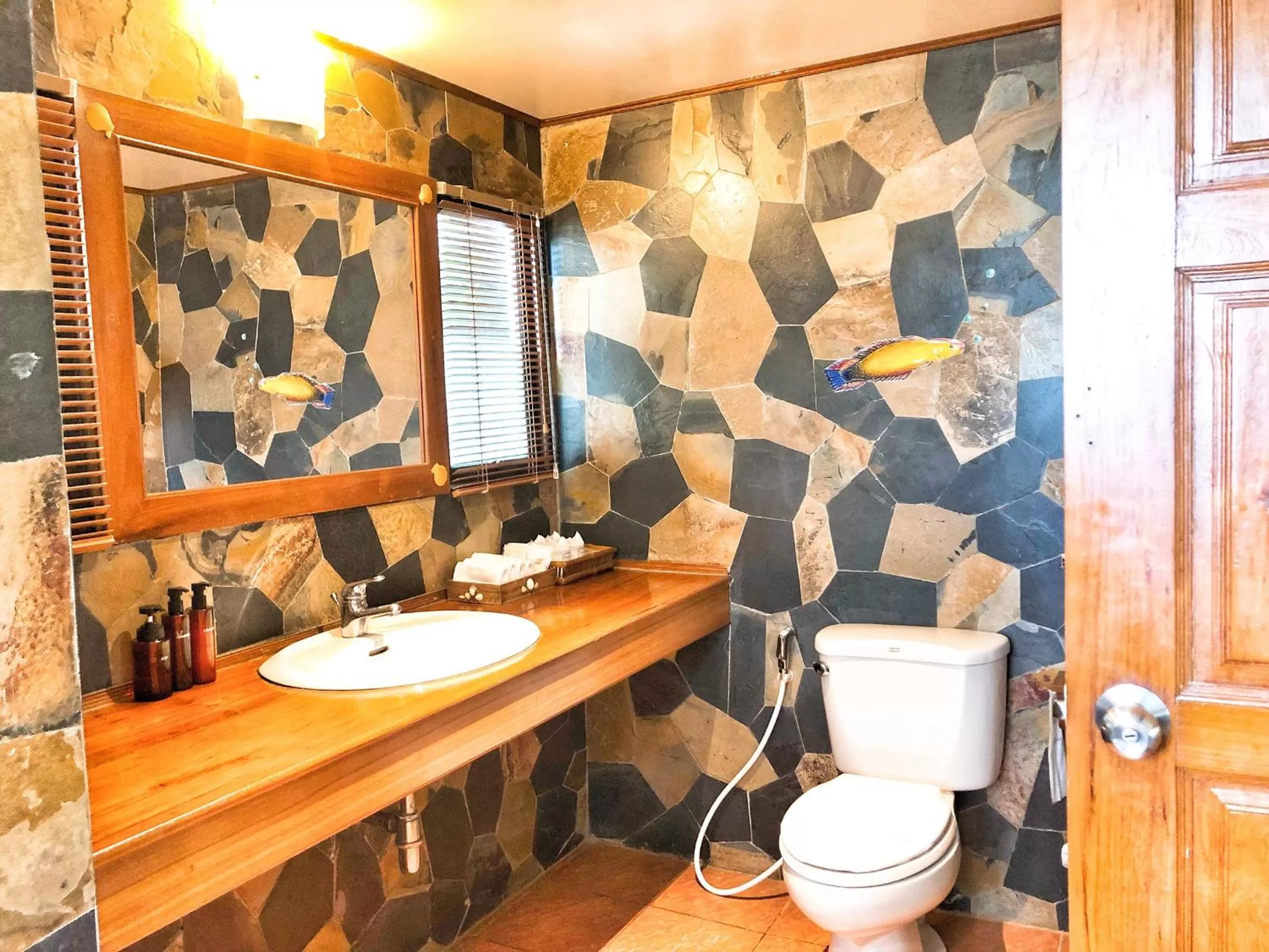 Toilet in Birds and Bees Resort