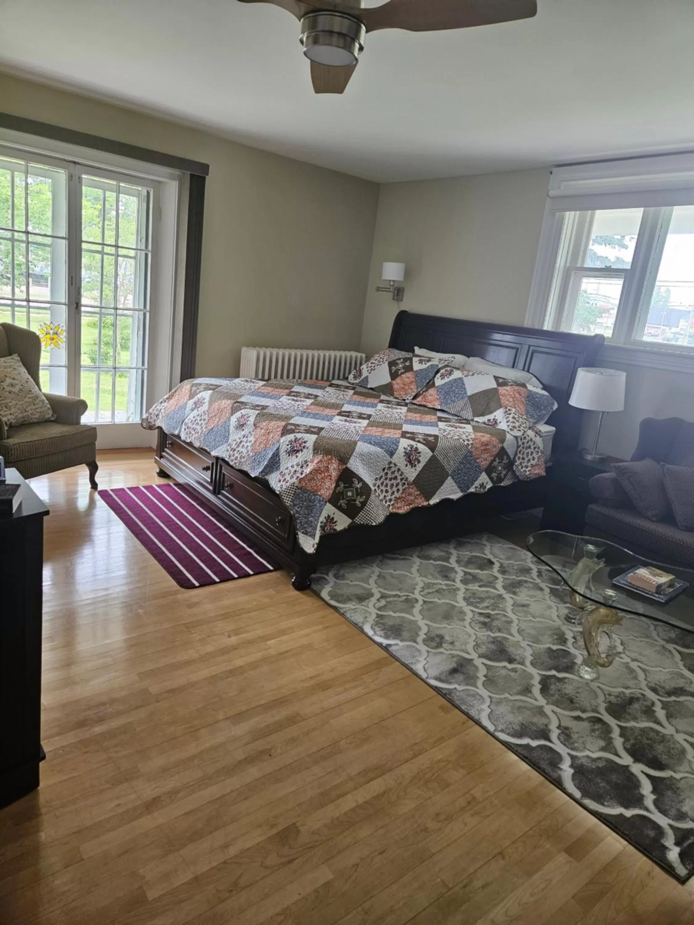 Bed in Sunflower Guest Suites