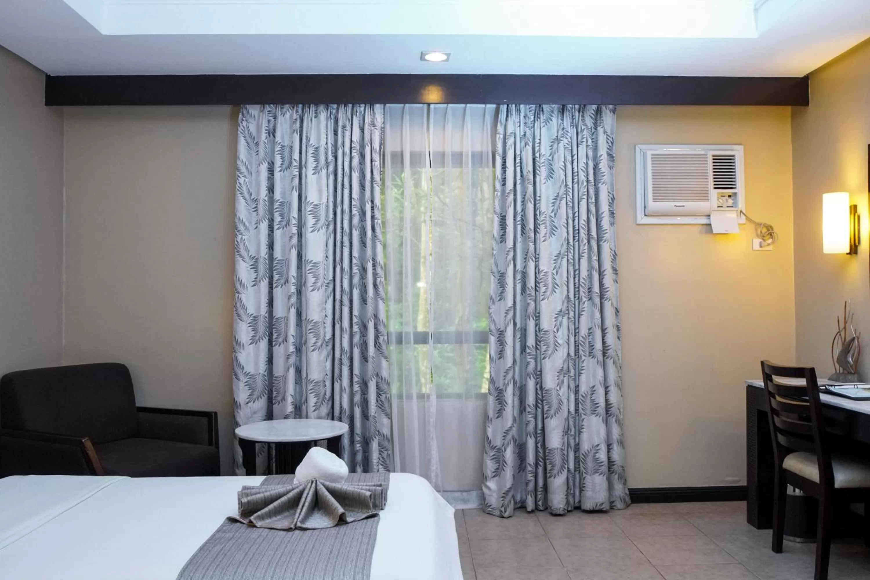 Photo of the whole room, Bed in Coron Westown Resort