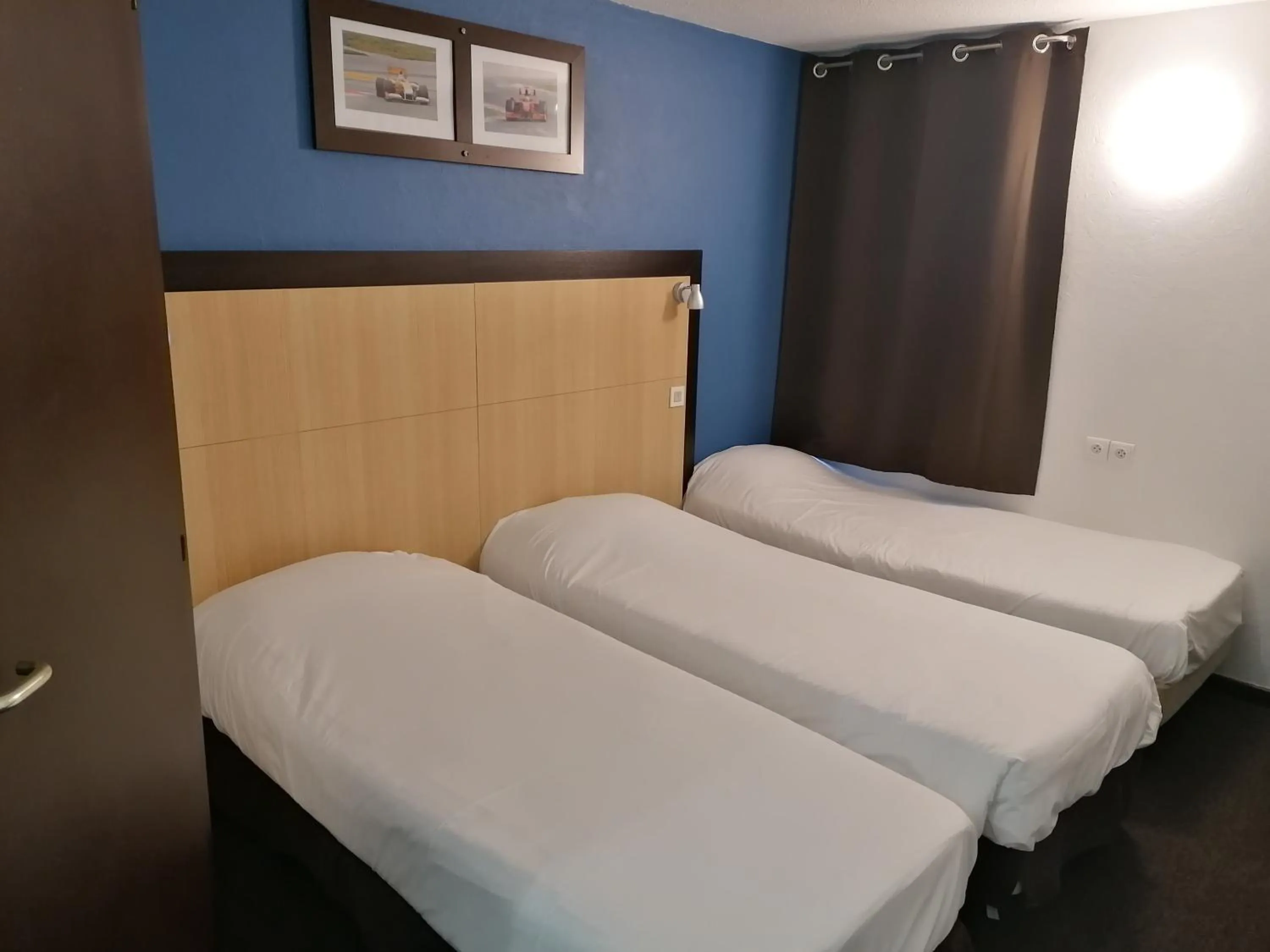 Bed in Enzo Hotels Vierzon by Kyriad Direct
