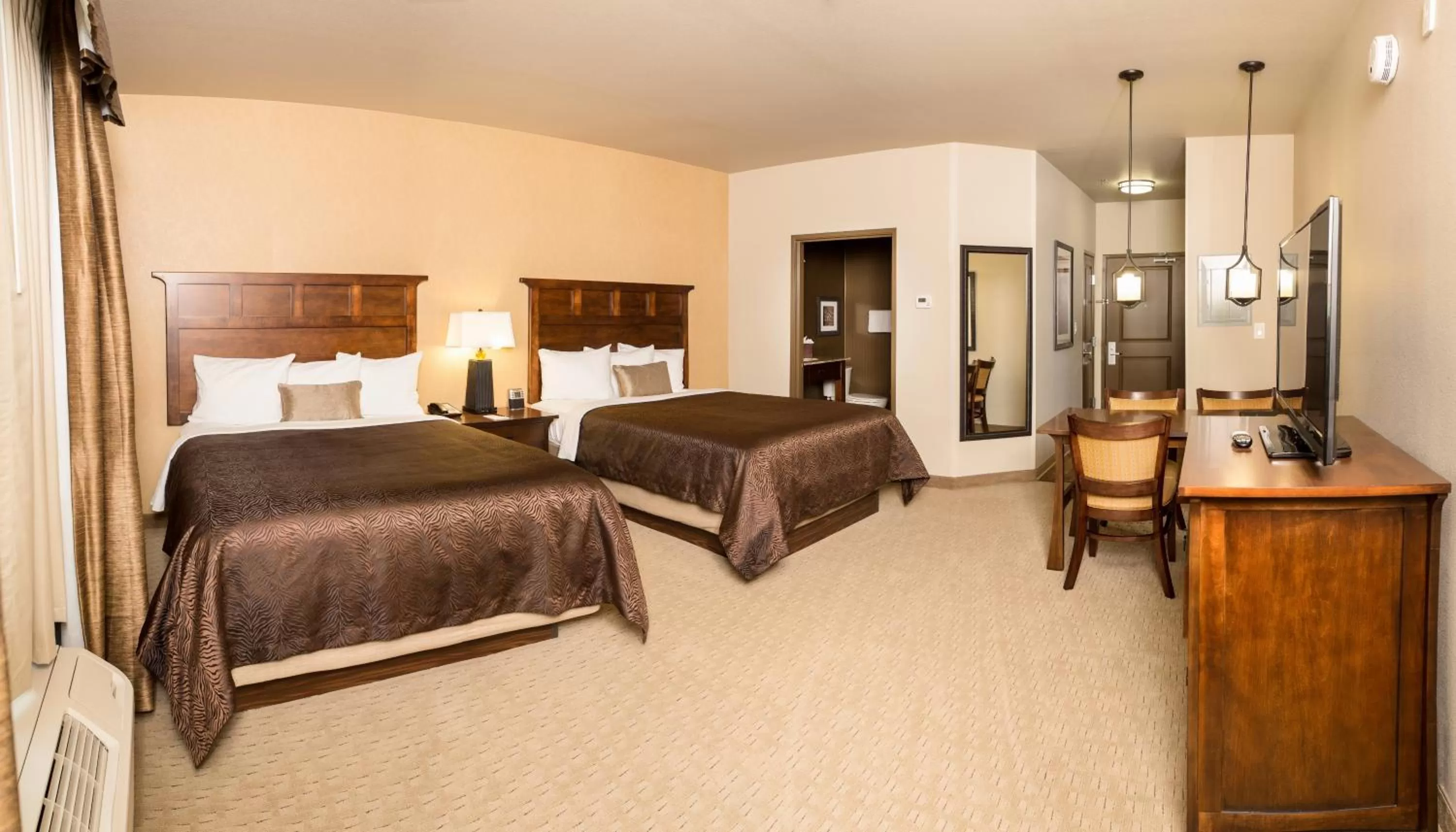 Bed in Teddy's Residential Suites Watford City