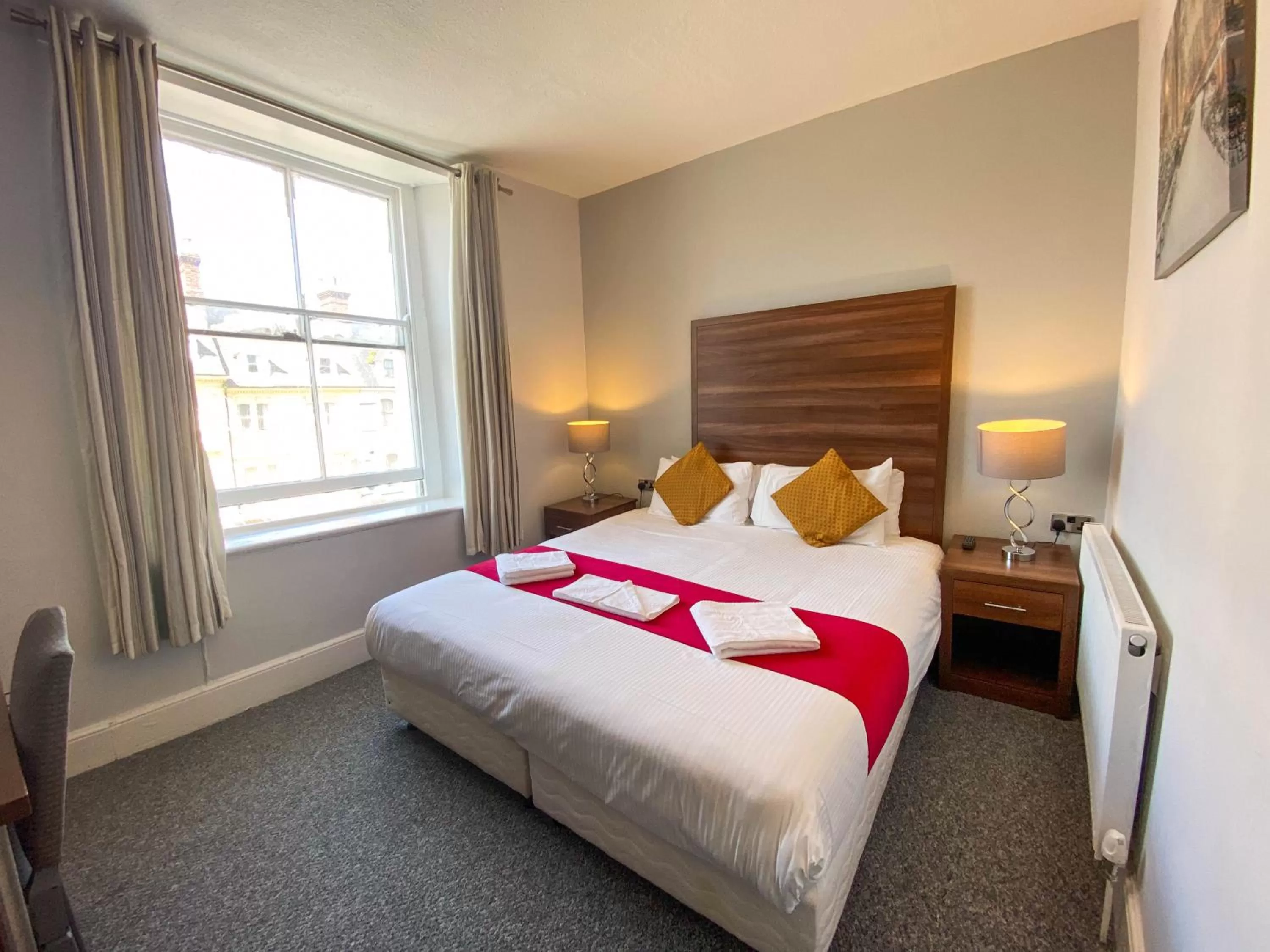 Bed in The Broadway Hotel