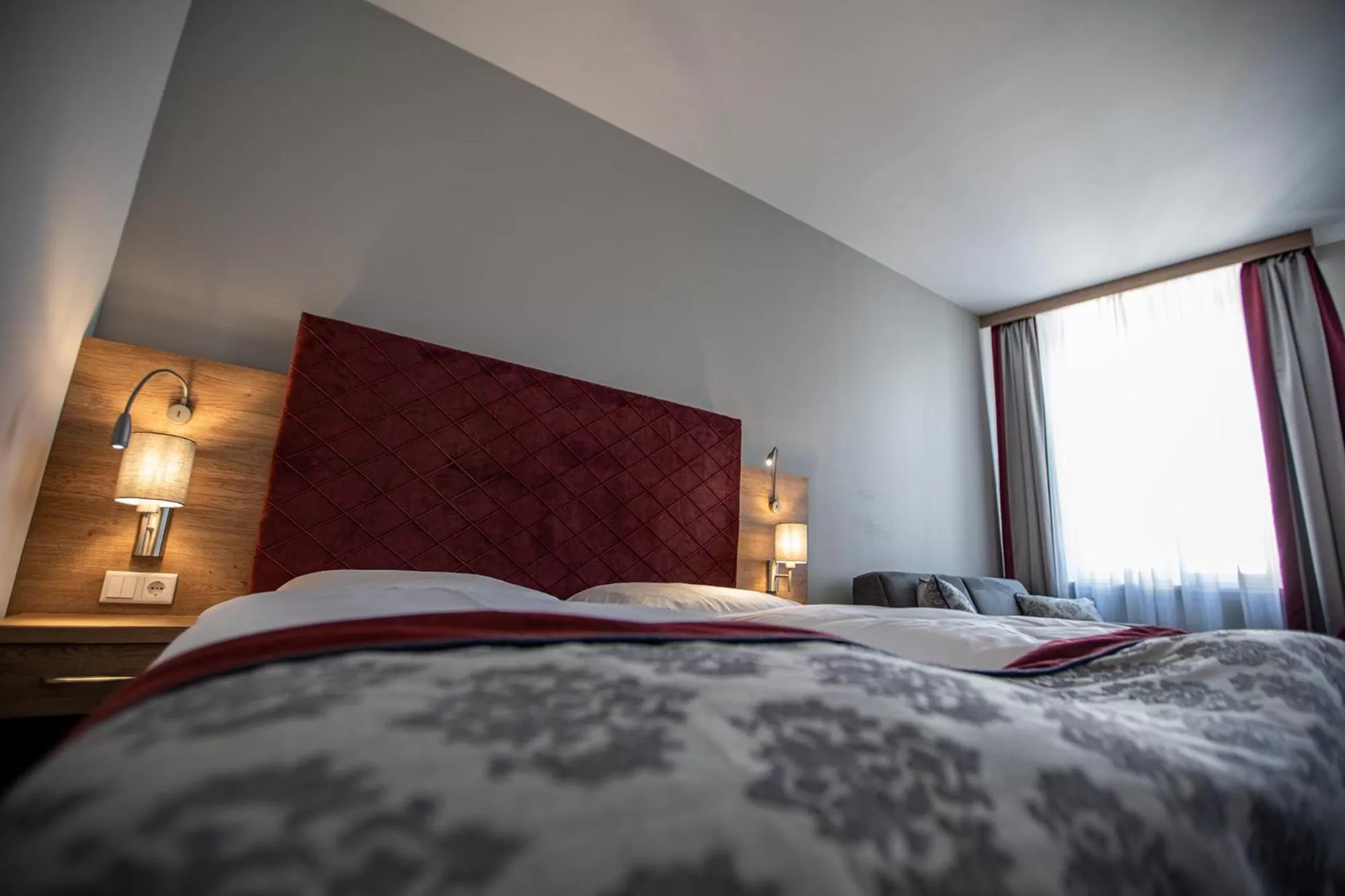 Bed in Hotel Elefant Family Business