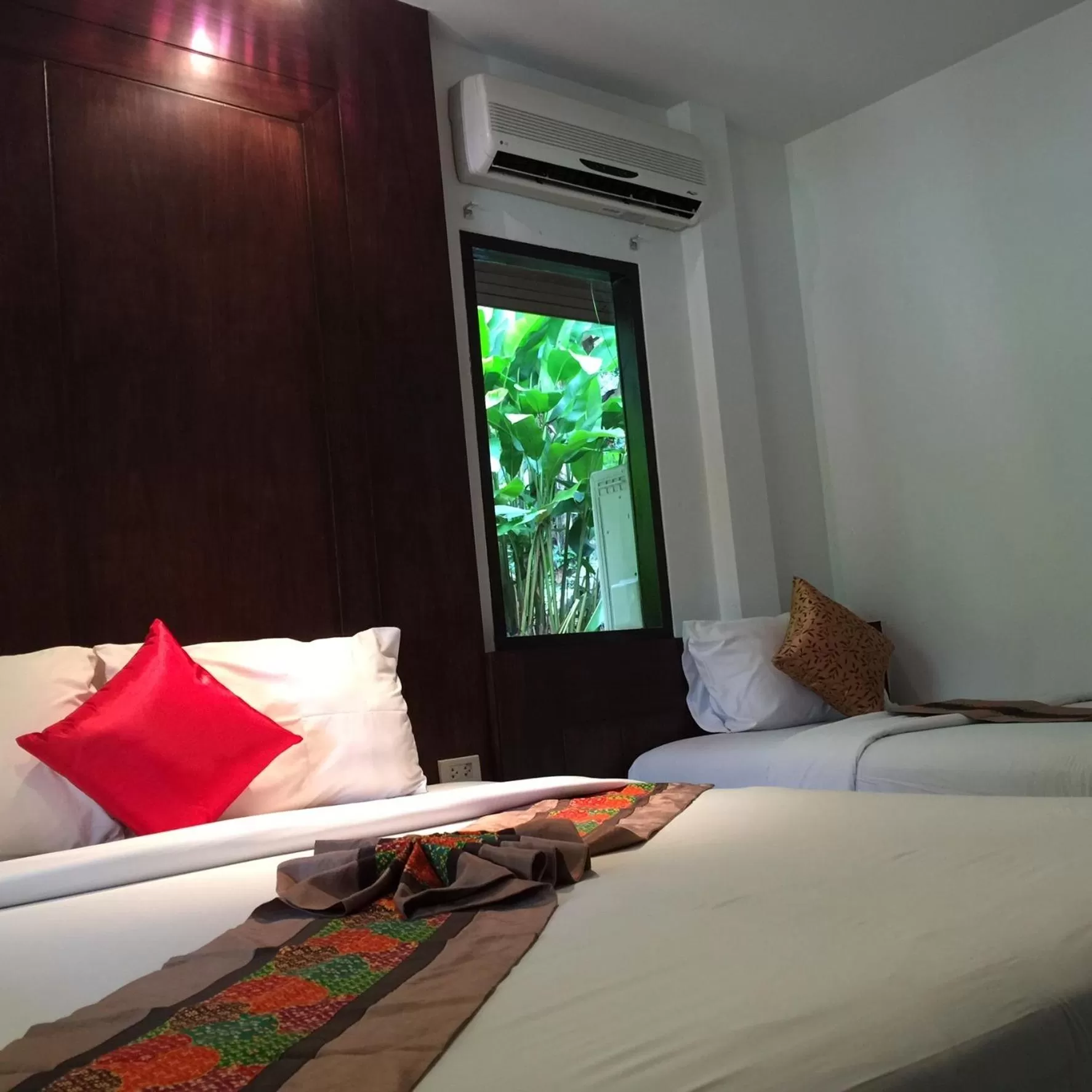 Bed in Vipa Tropical Resort