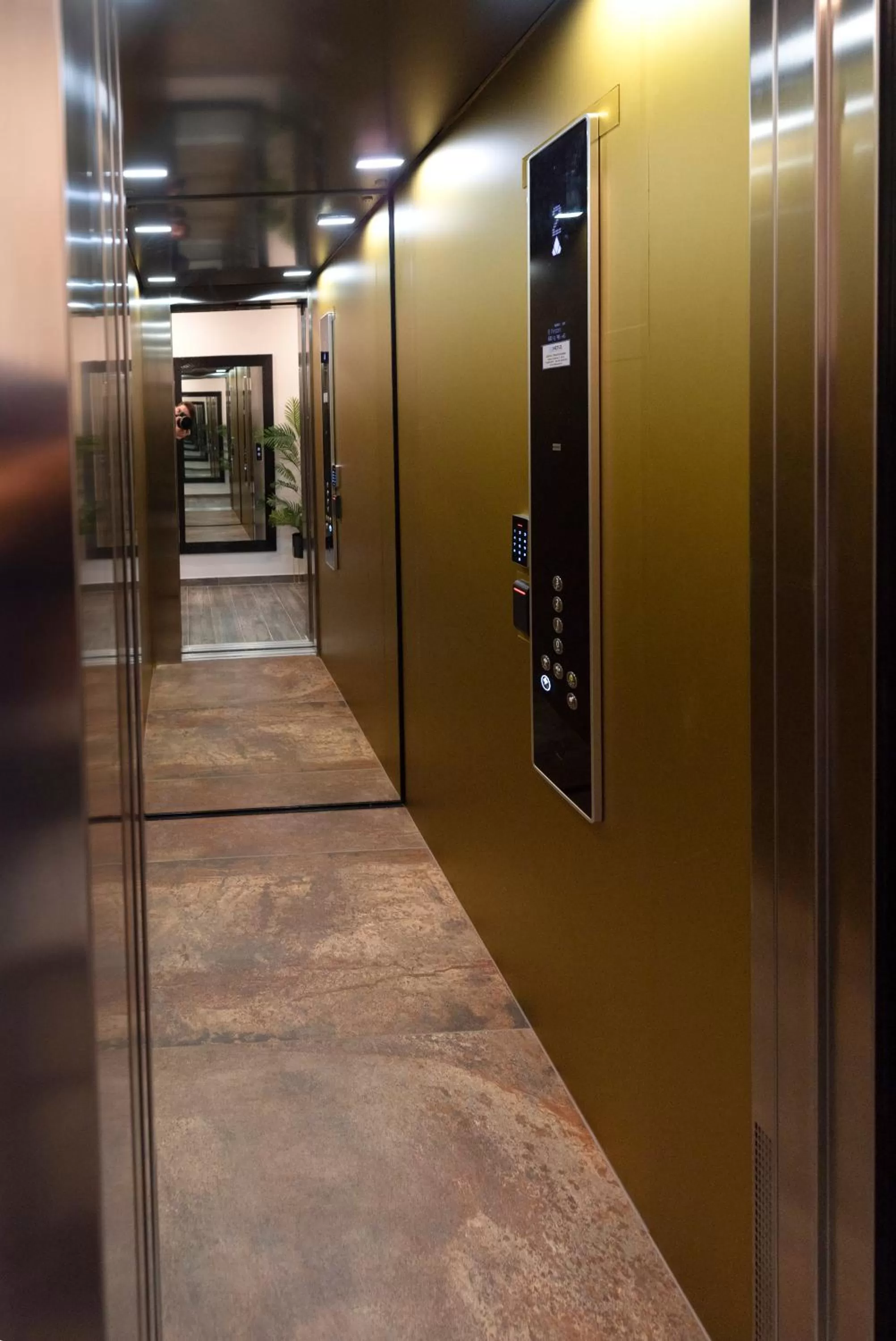 elevator in Arcobaleno Apartments & Rooms