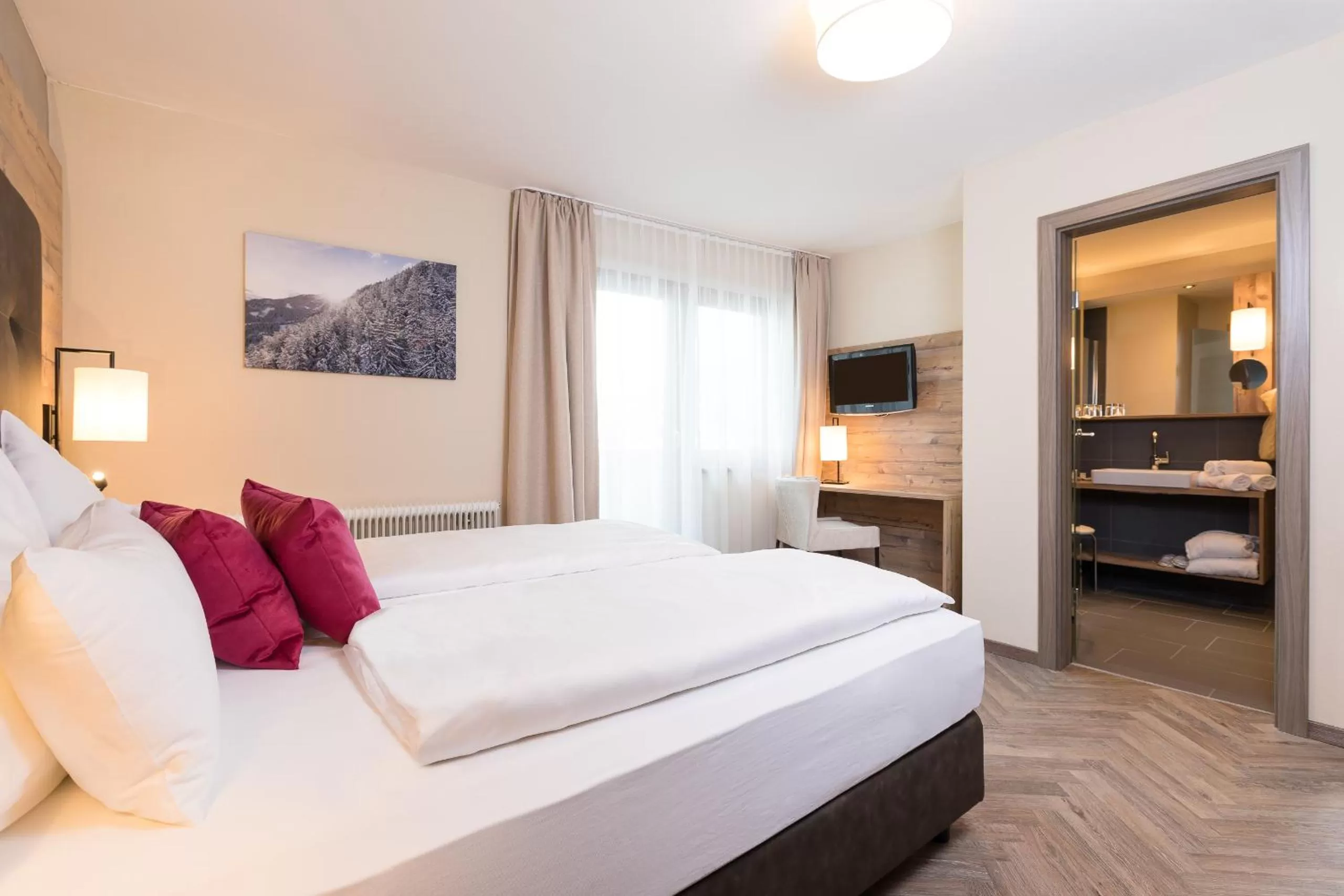 Bed in Alpenhotel Tirolerhof