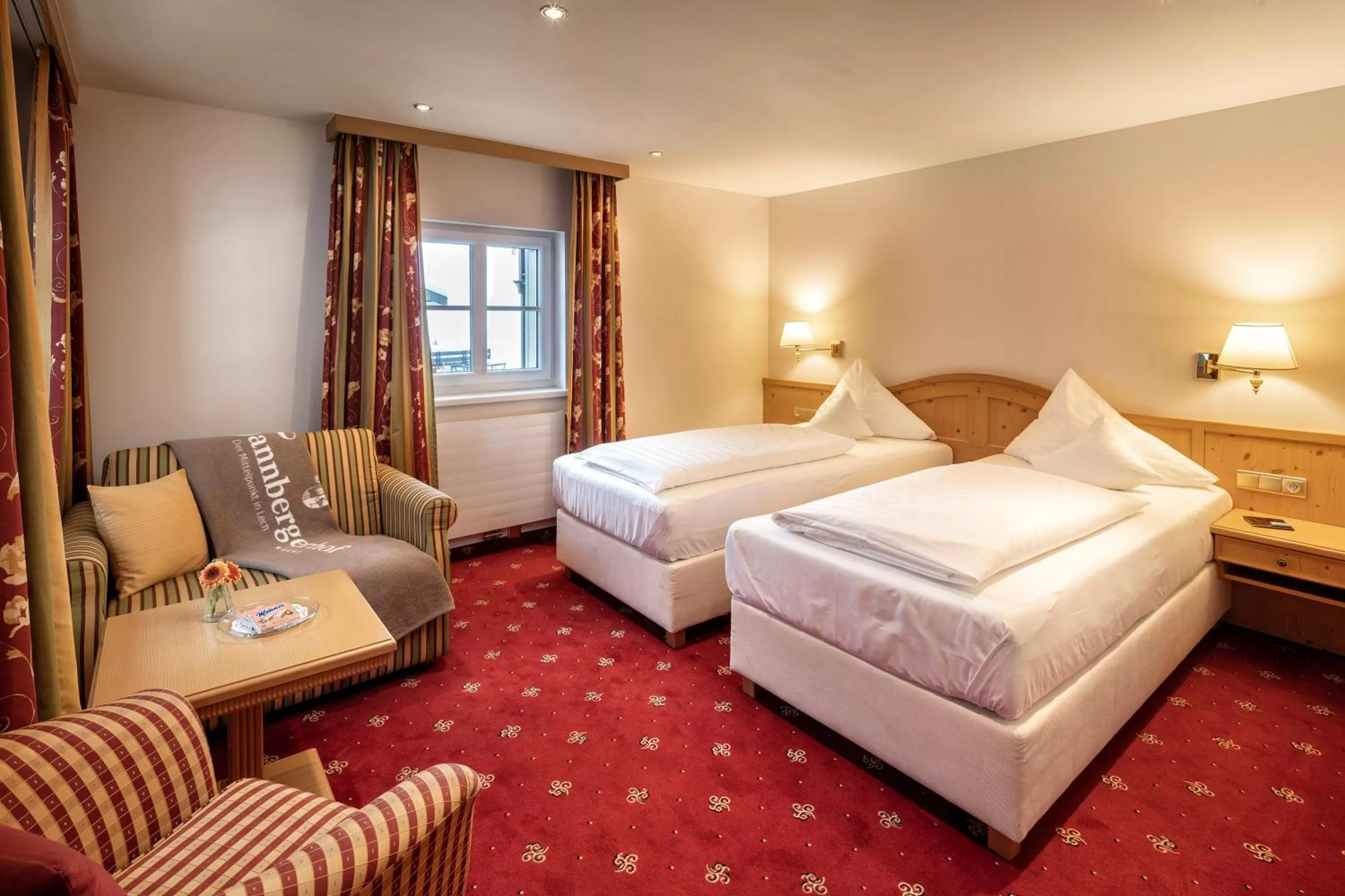 Photo of the whole room, Bed in Hotel Tannbergerhof im Zentrum von Lech