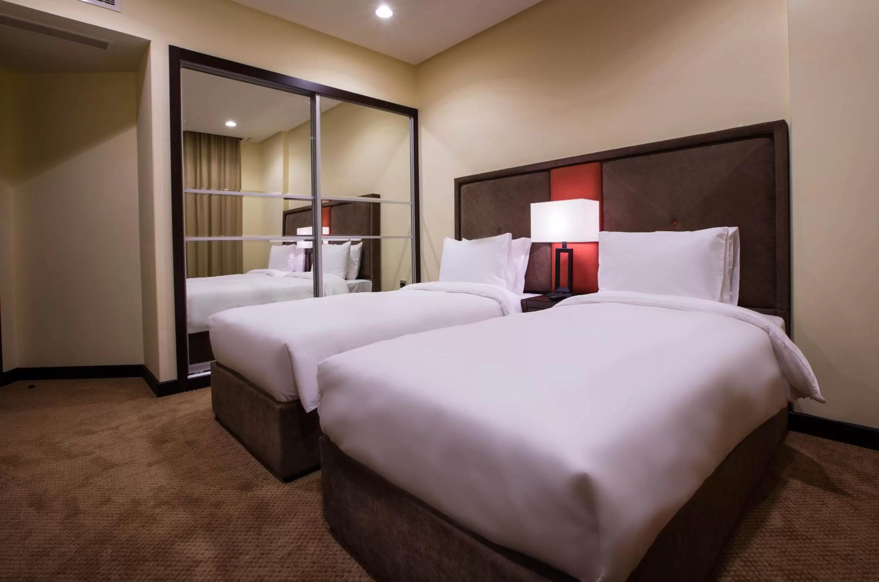 Bedroom, Bed in Orange Suites Hotel