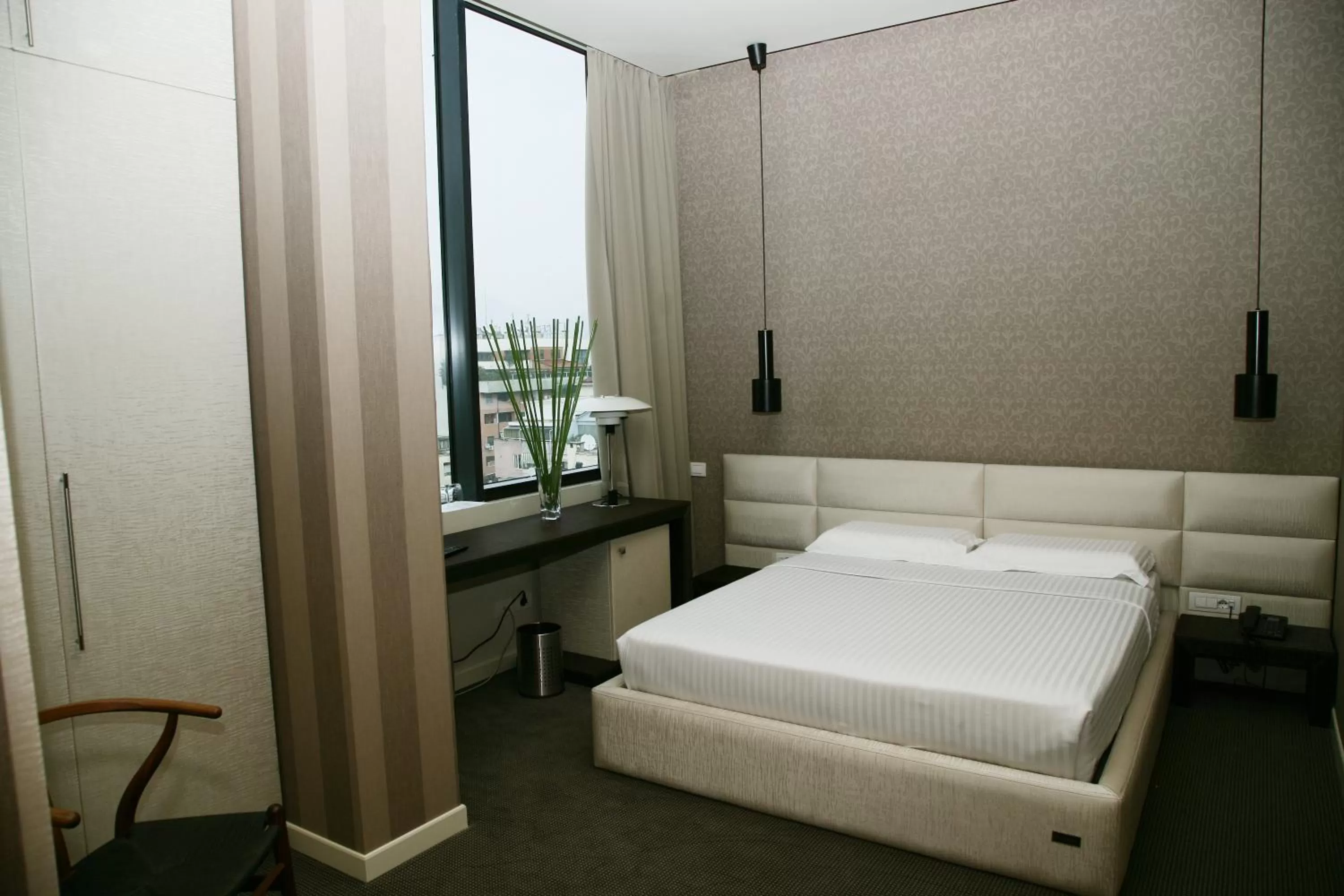 Bed in La Bohème Hotel