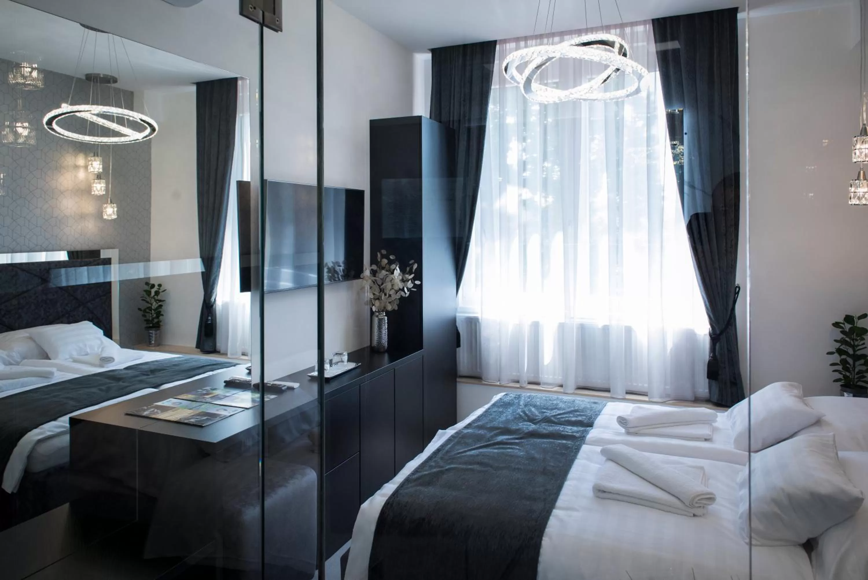 Photo of the whole room, Bed in Z Rooms Boutique