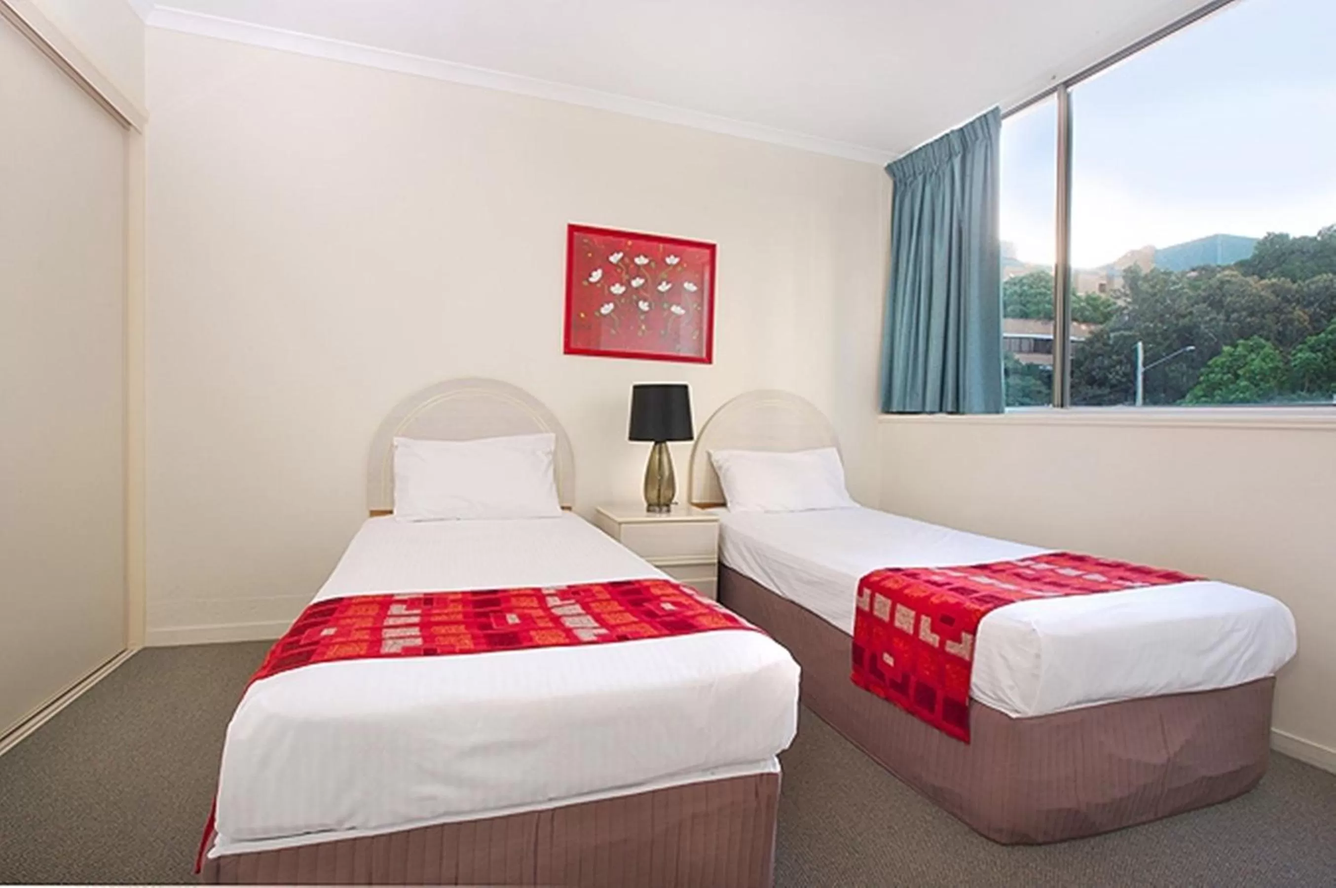 Bed in Chasely Apartment Hotel