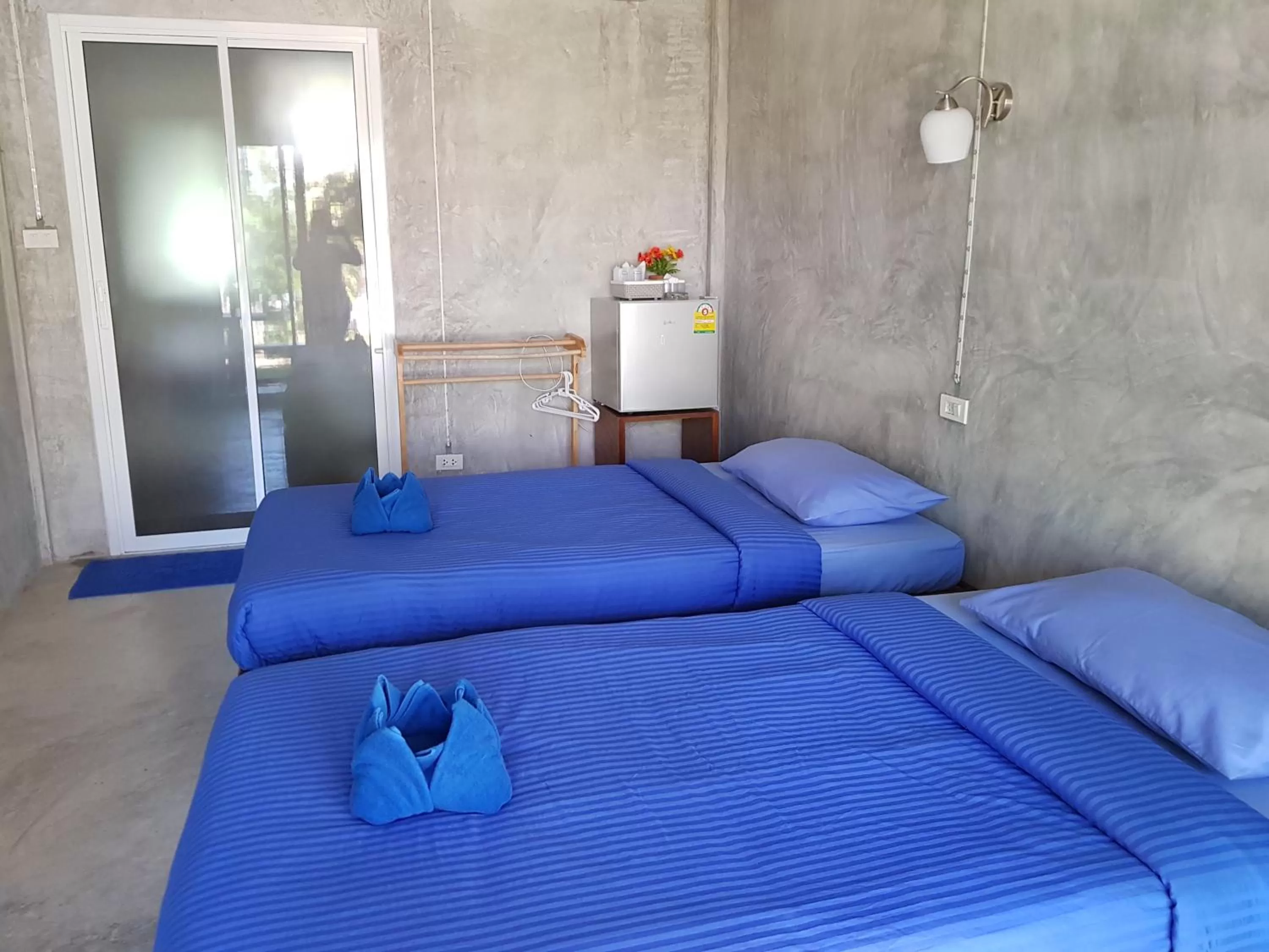 Bed in S Beach Resort