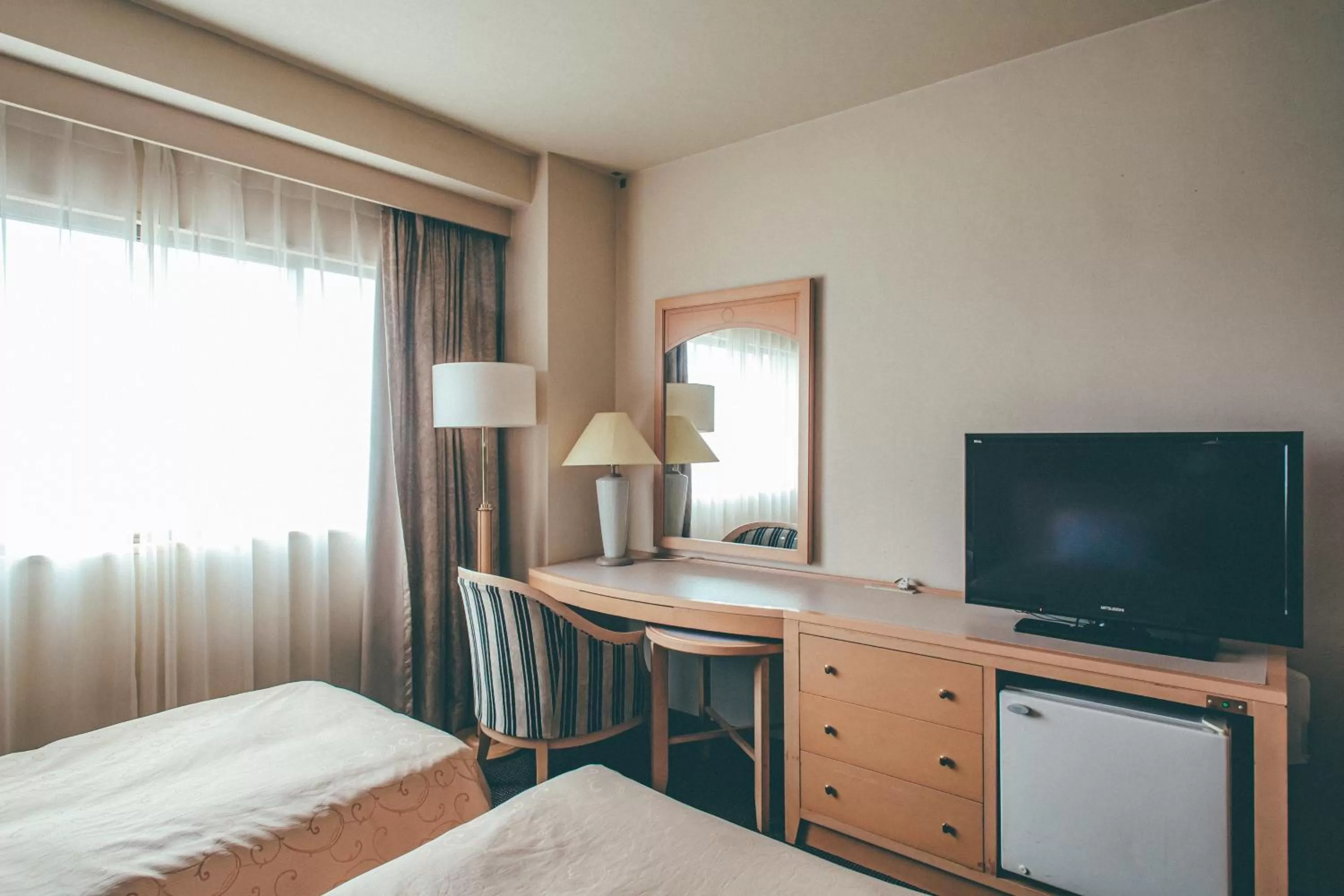 Bed in Numazu River Side Hotel