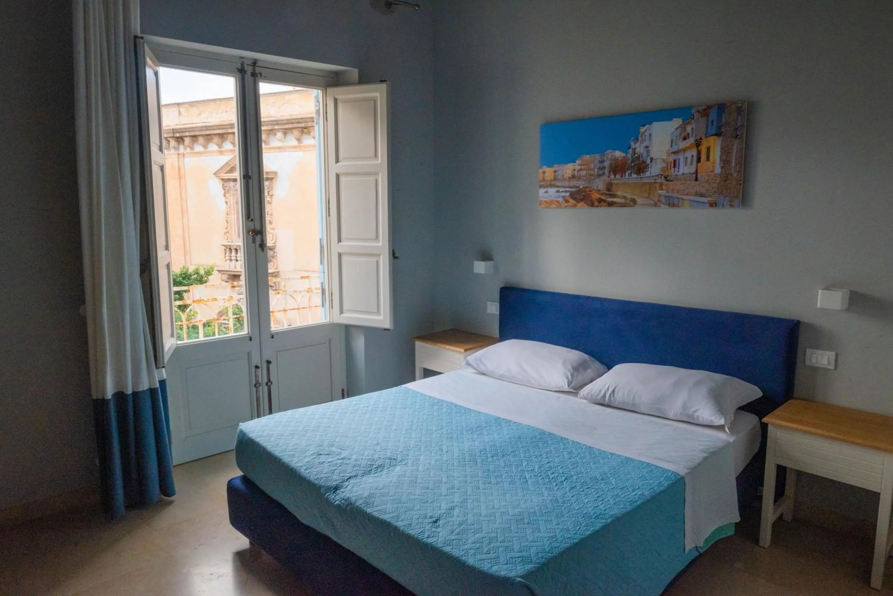 Bedroom, Bed in ZIBIBBO SUITES & ROOMS - Aparthotel in Centro Storico a Trapani
