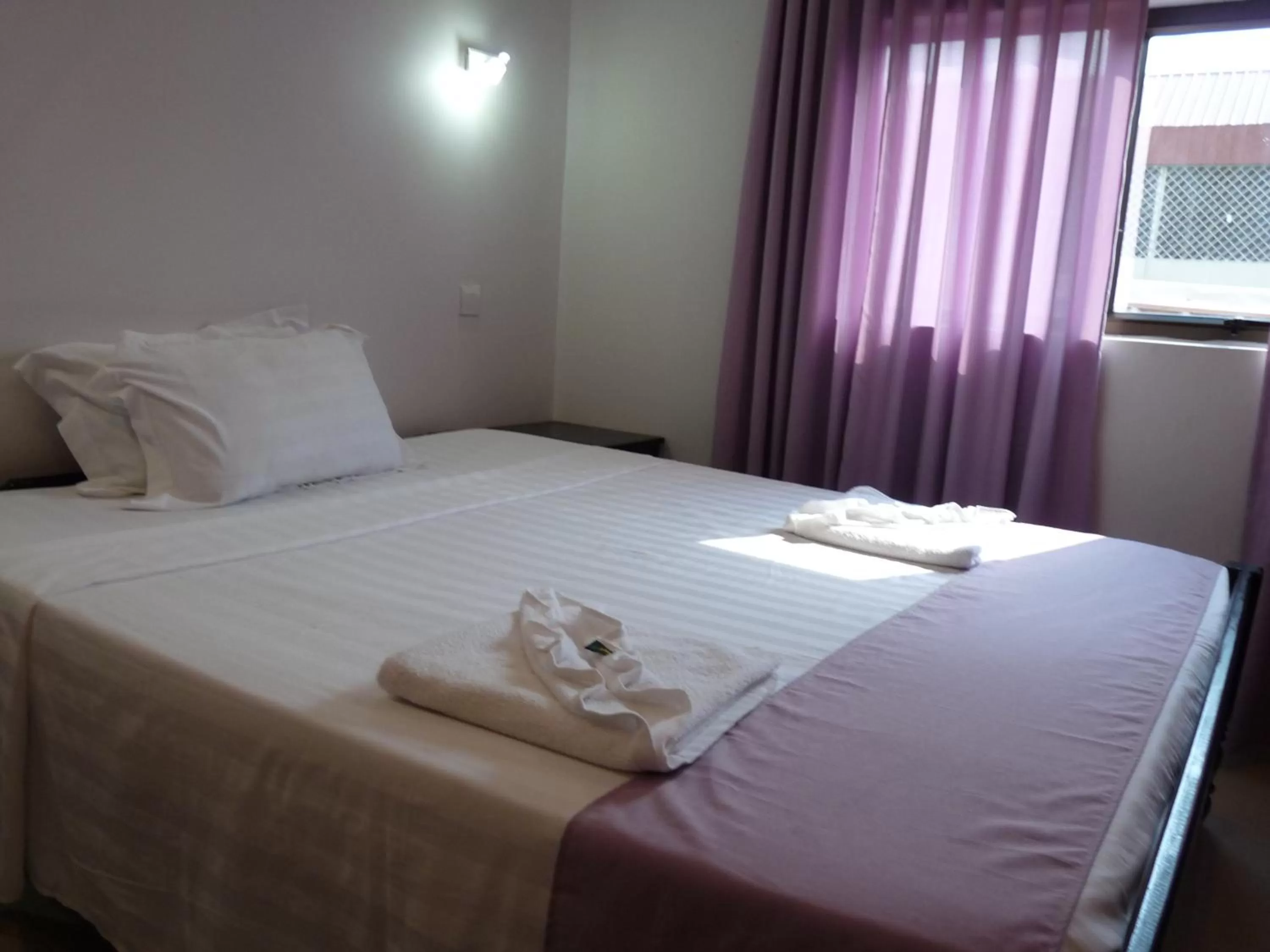 Bed in Angkor International Hotel