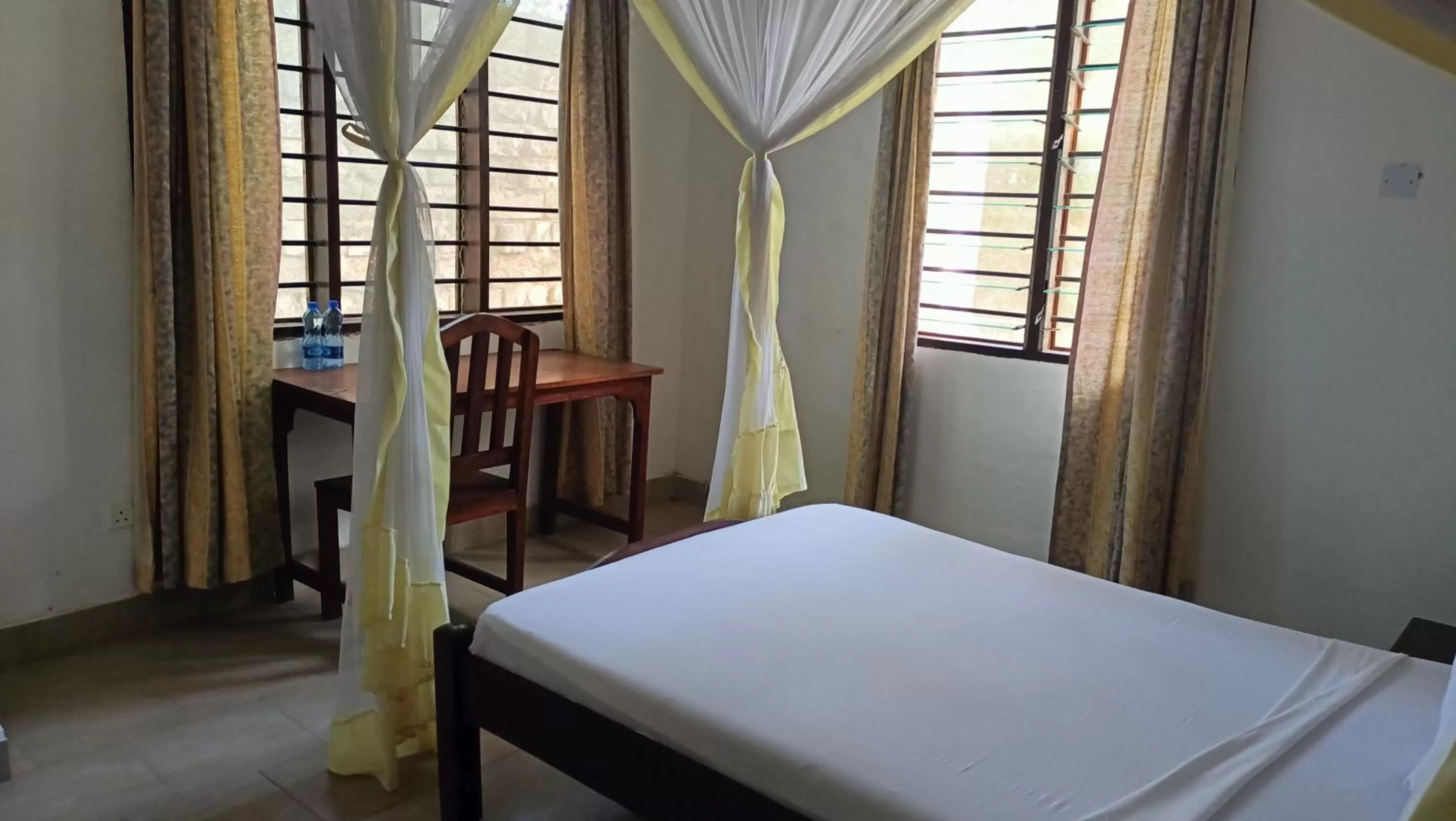 Bed in Makuti Villas Resort