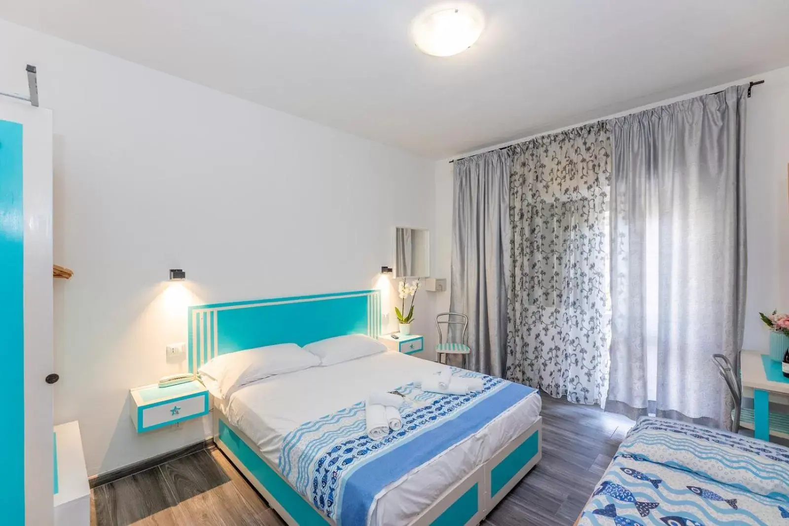 Economy Quadruple Room in B&B Oasi Economy Quadruple Room in B&B Oasi