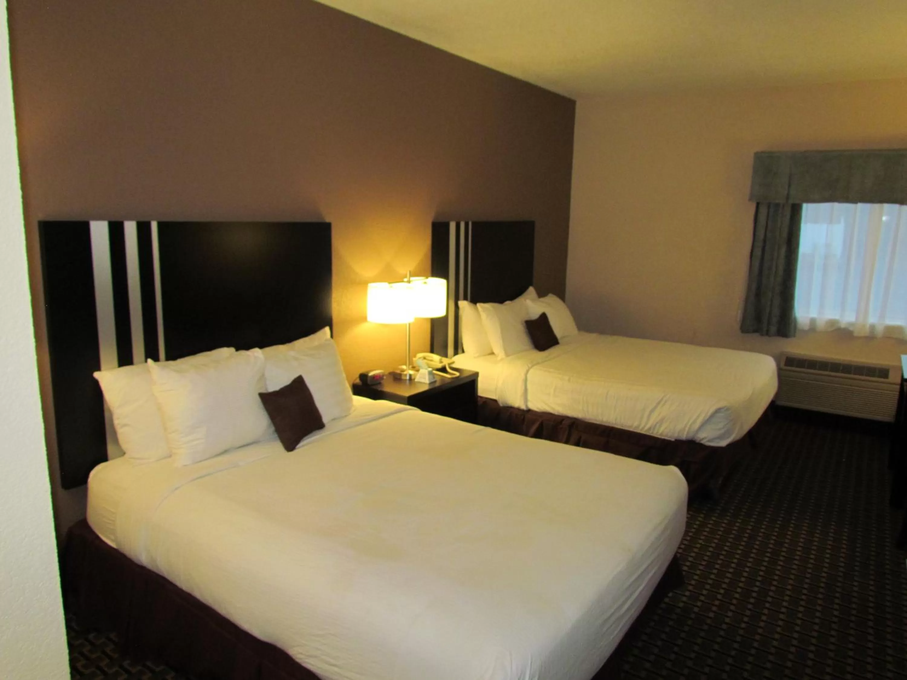 Bed in Ramada by Wyndham Glendale Heights/Lombard