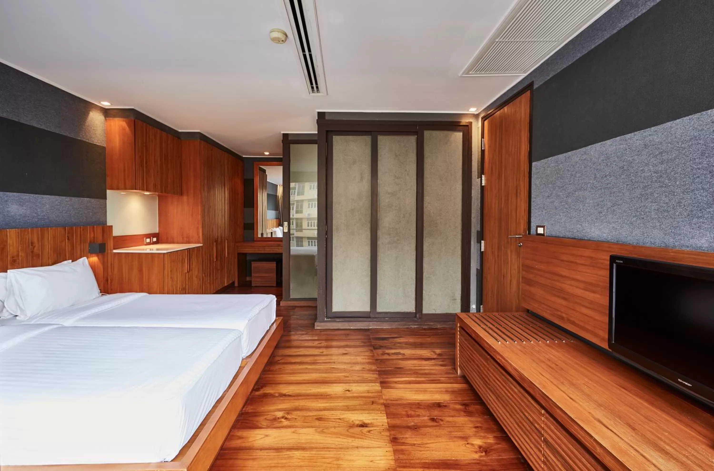 Bed in LUXX Langsuan Hotel - SHA Plus