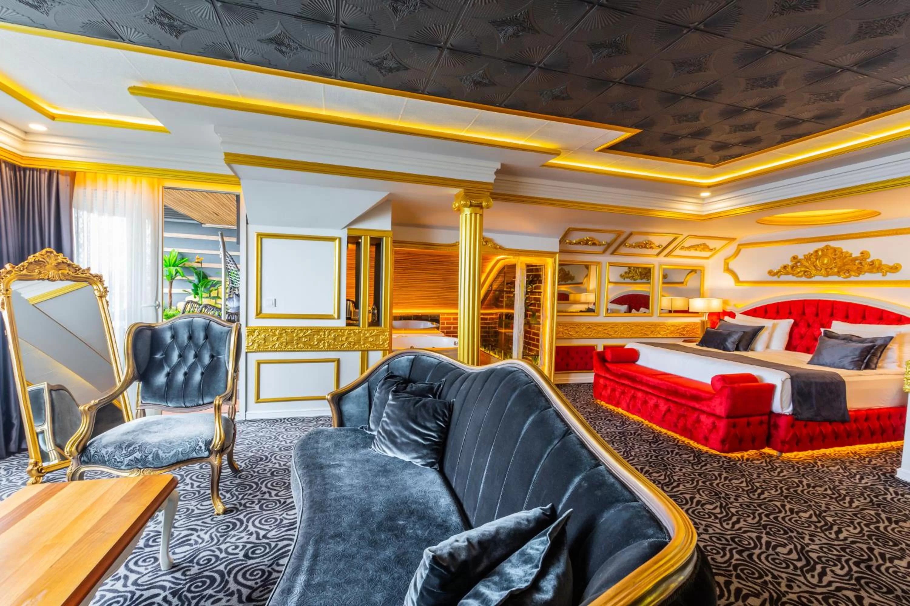 Communal lounge/ TV room, Bed in Andalouse Otel