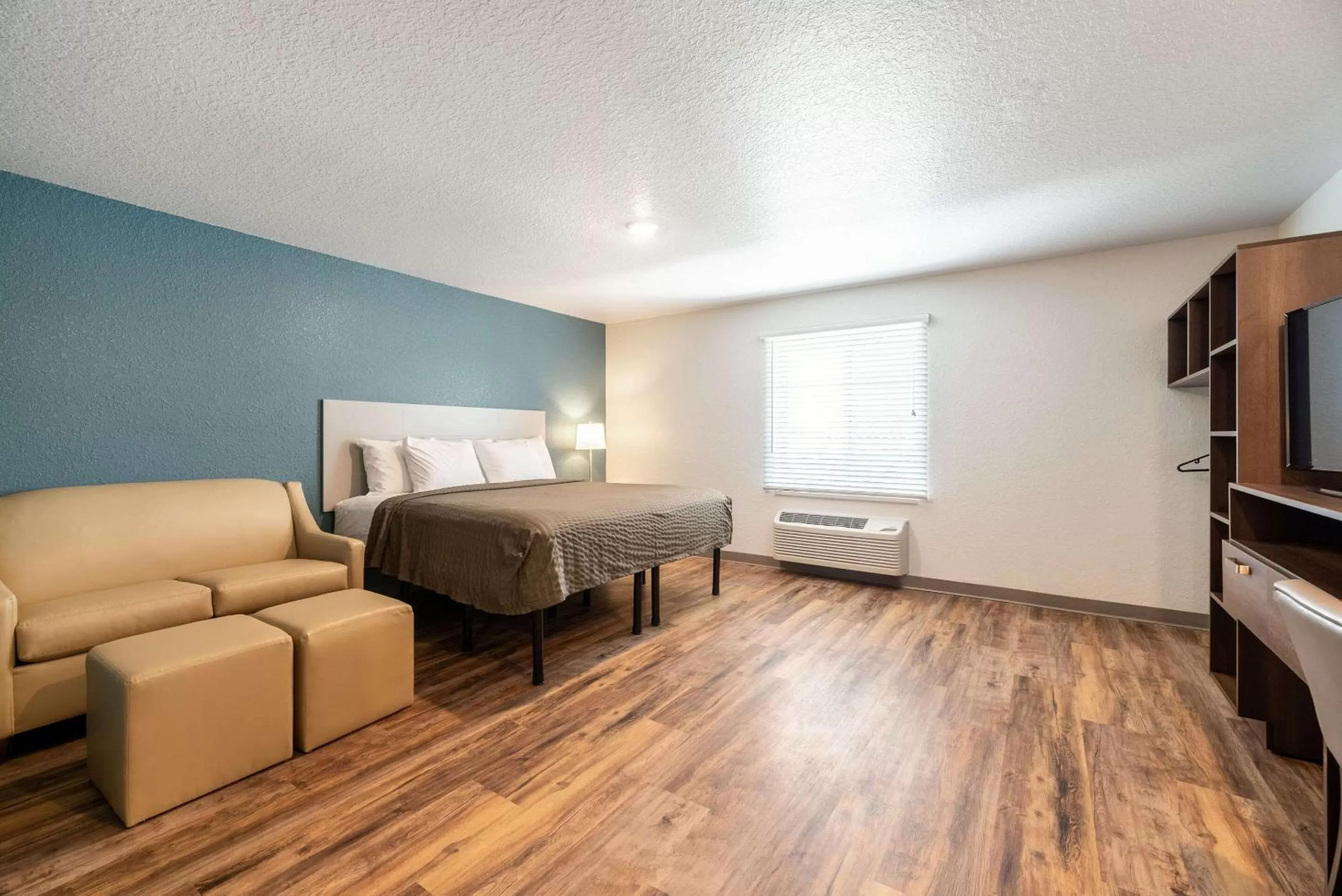 Photo of the whole room, Bed in WoodSpring Suites Sanford North I-4 Orlando Area