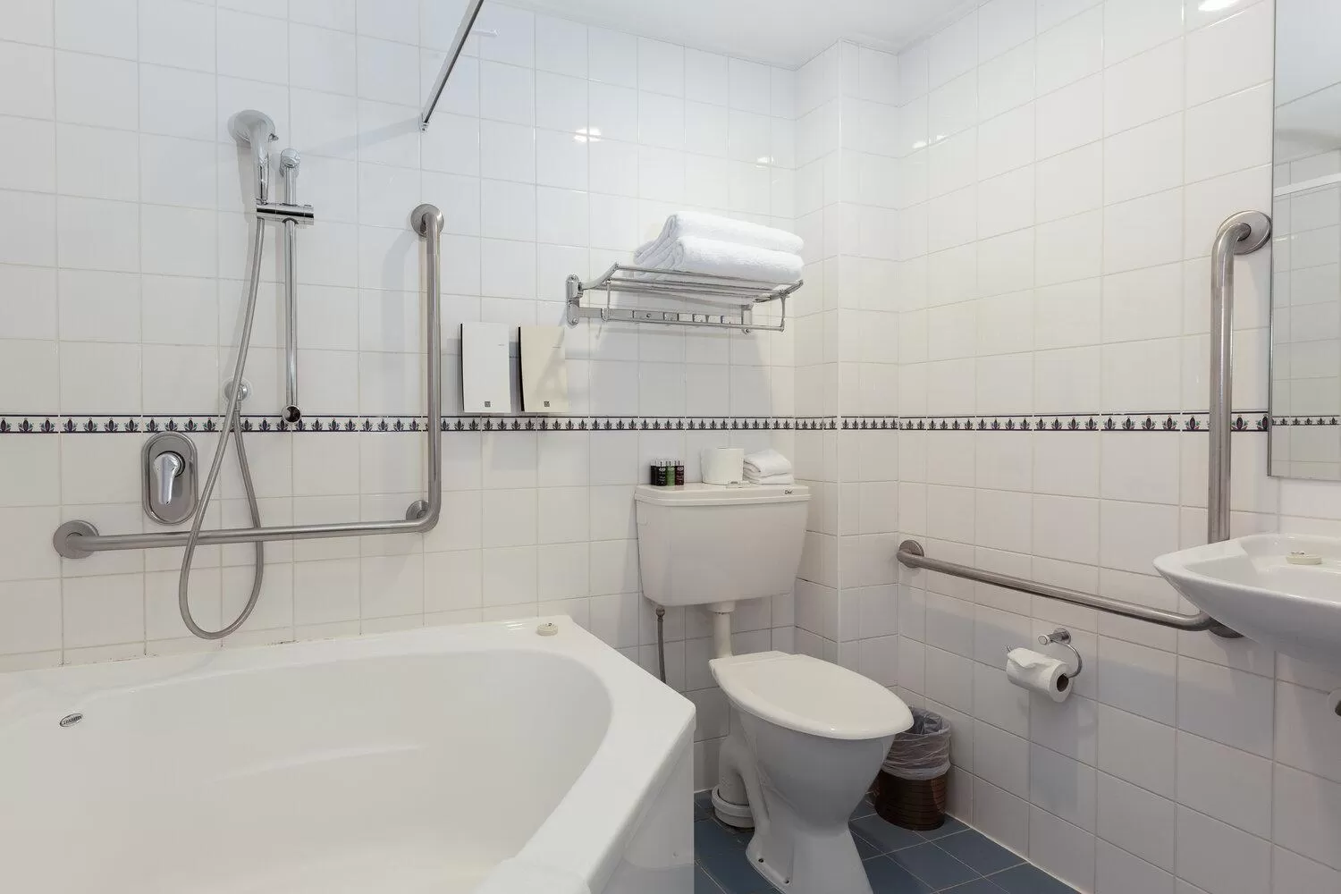 Bathroom in Fino Hotel & Suites