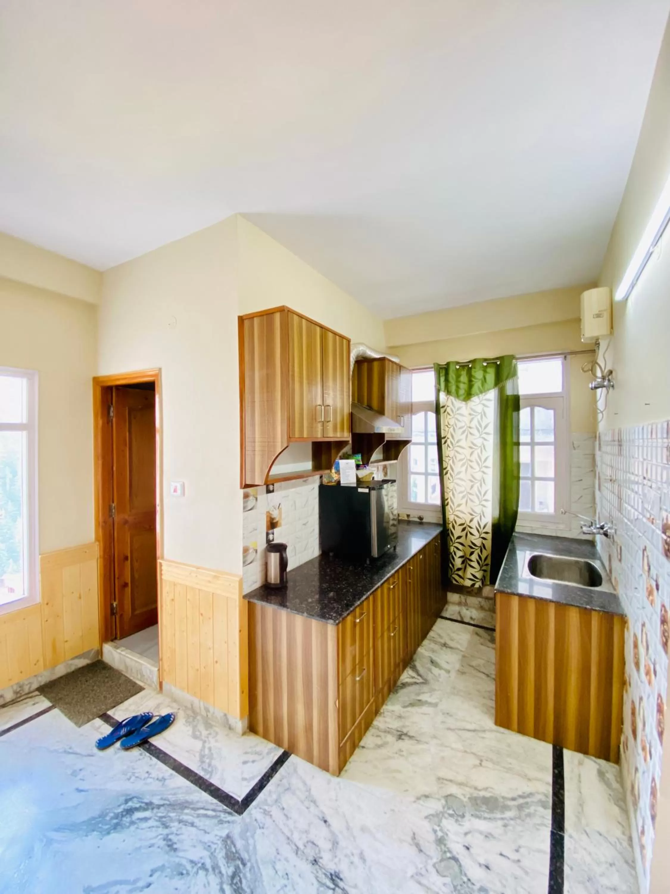 Kitchen or kitchenette in Sai Cottage Shimla