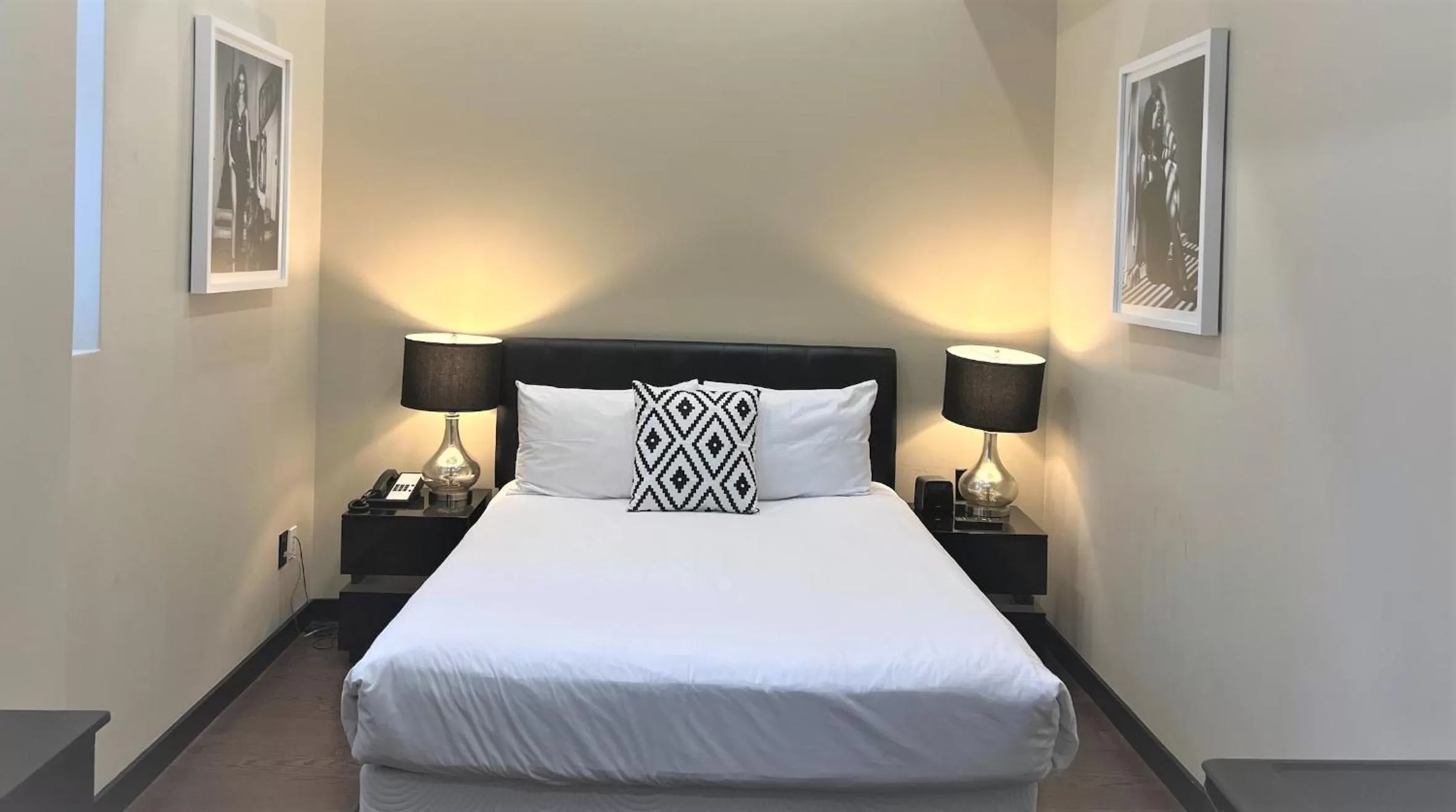 Bed in Cachet Boutique Hotel NYC