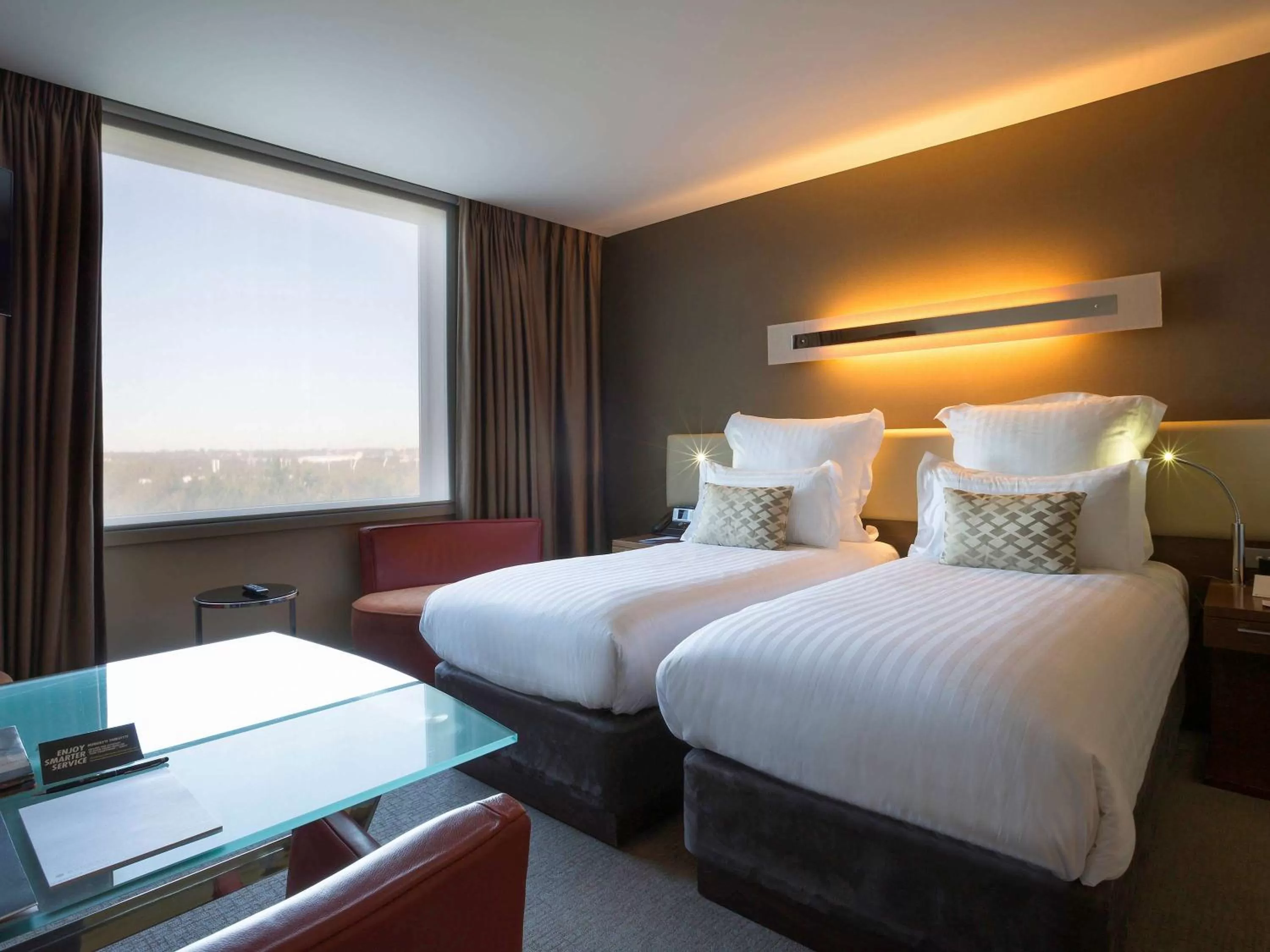 Photo of the whole room, Bed in Pullman Sydney Olympic Park