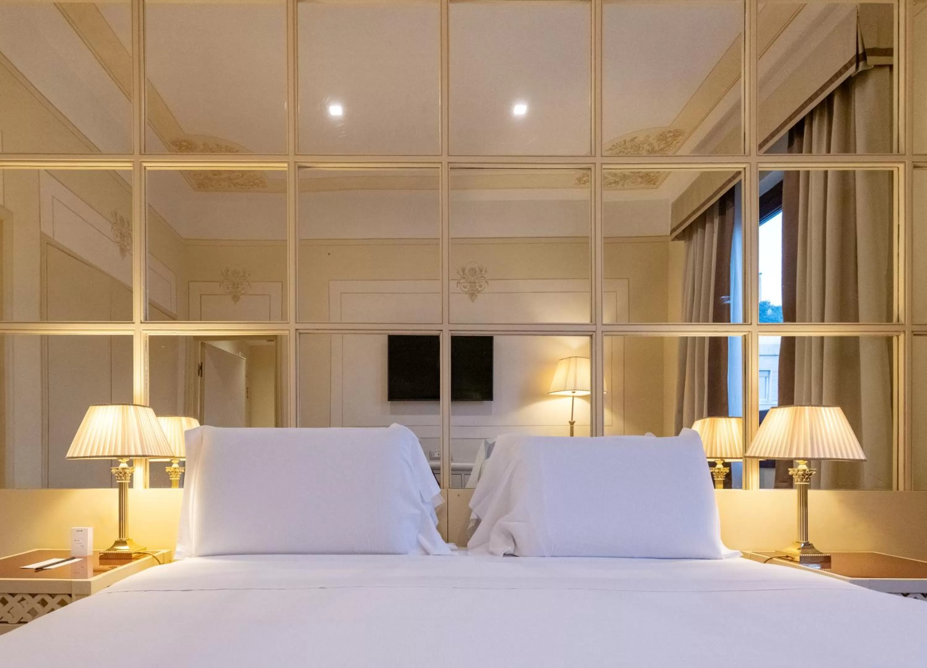 Bed in Radisson Blu GHR Rome