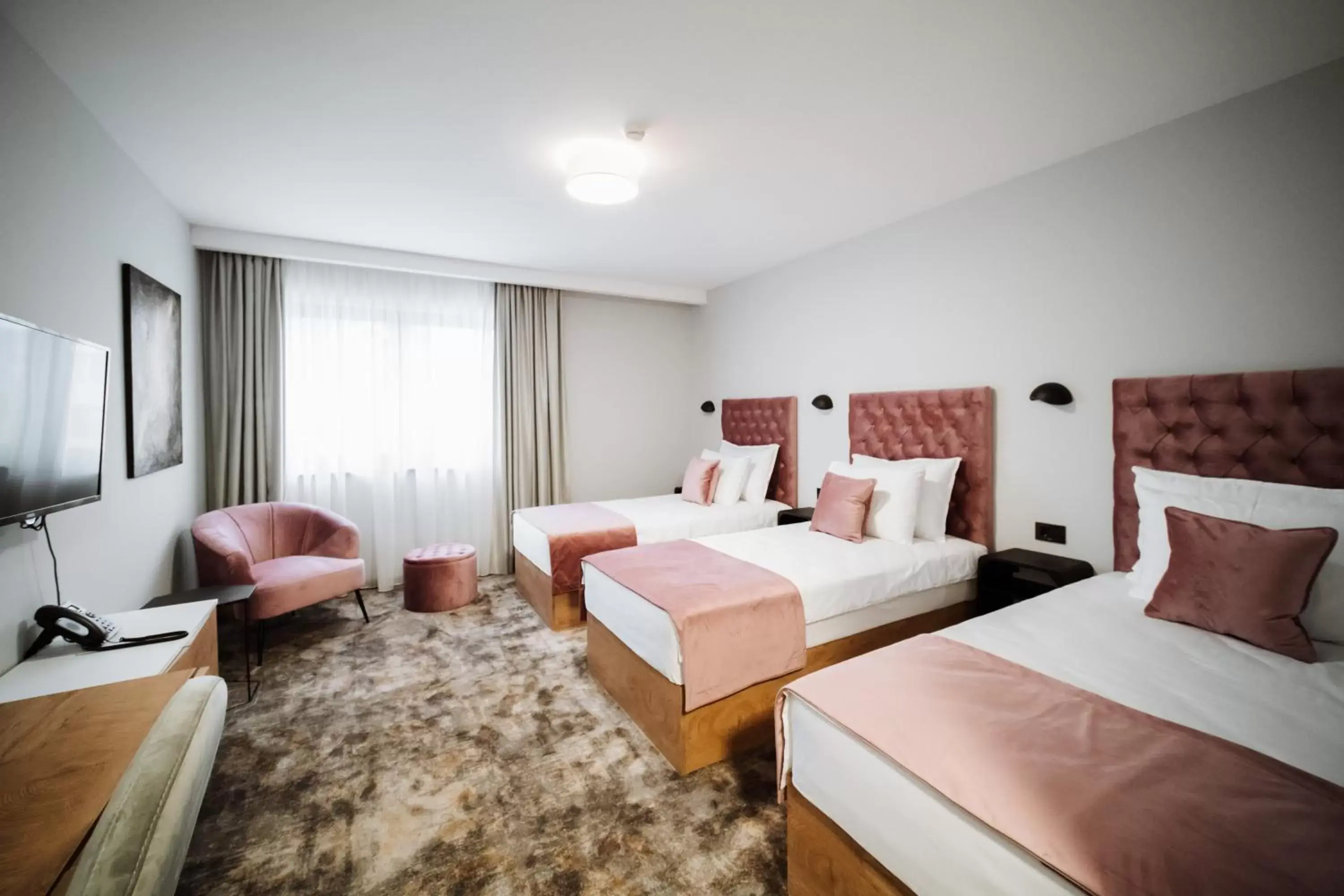 Deluxe Triple Room in Hotel Barcode Wellness & Spa Deluxe Triple Room in Hotel Barcode Wellness & Spa