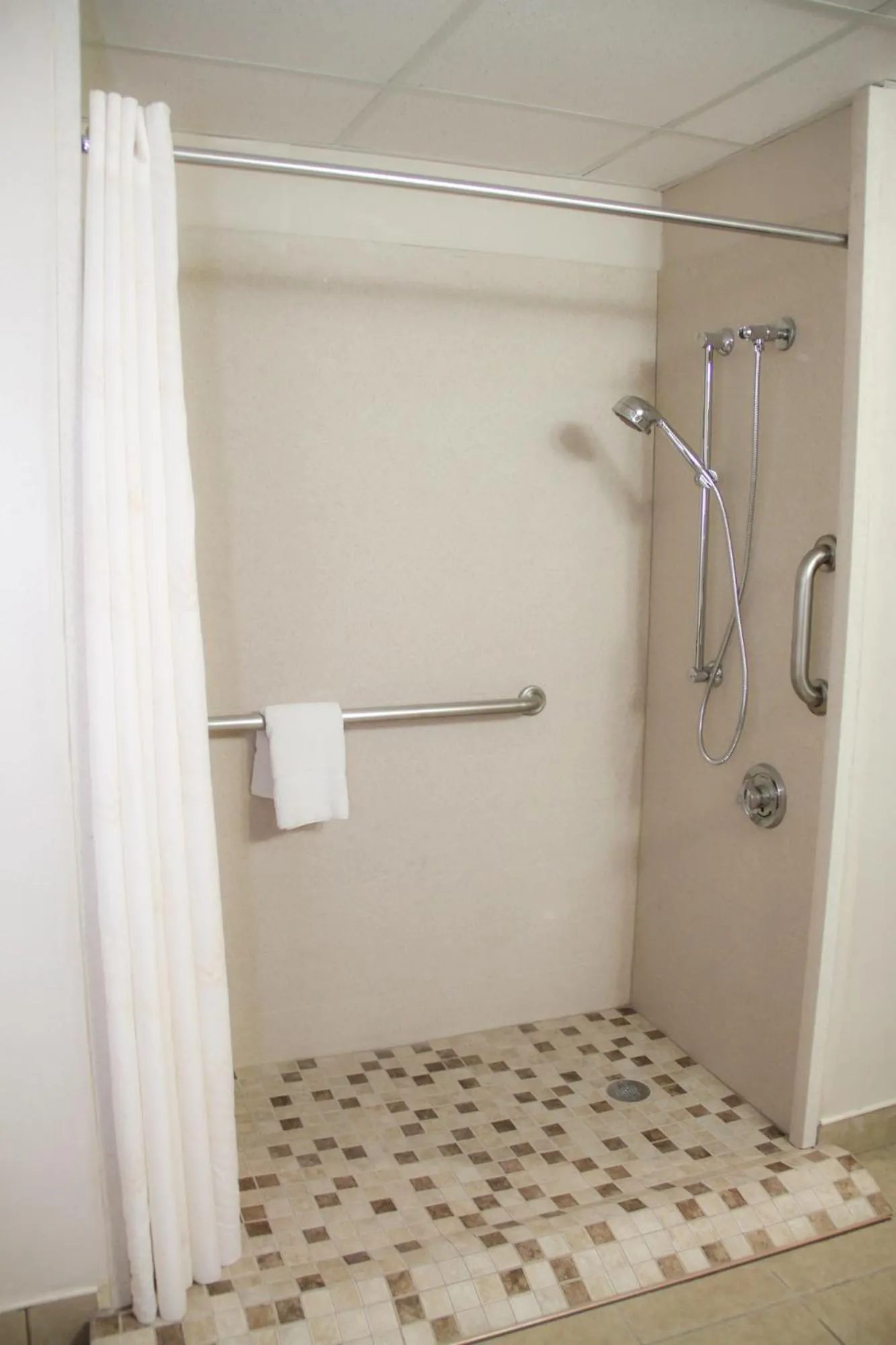 Shower in Comfort Inn & Suites Syracuse-Carrier Circle