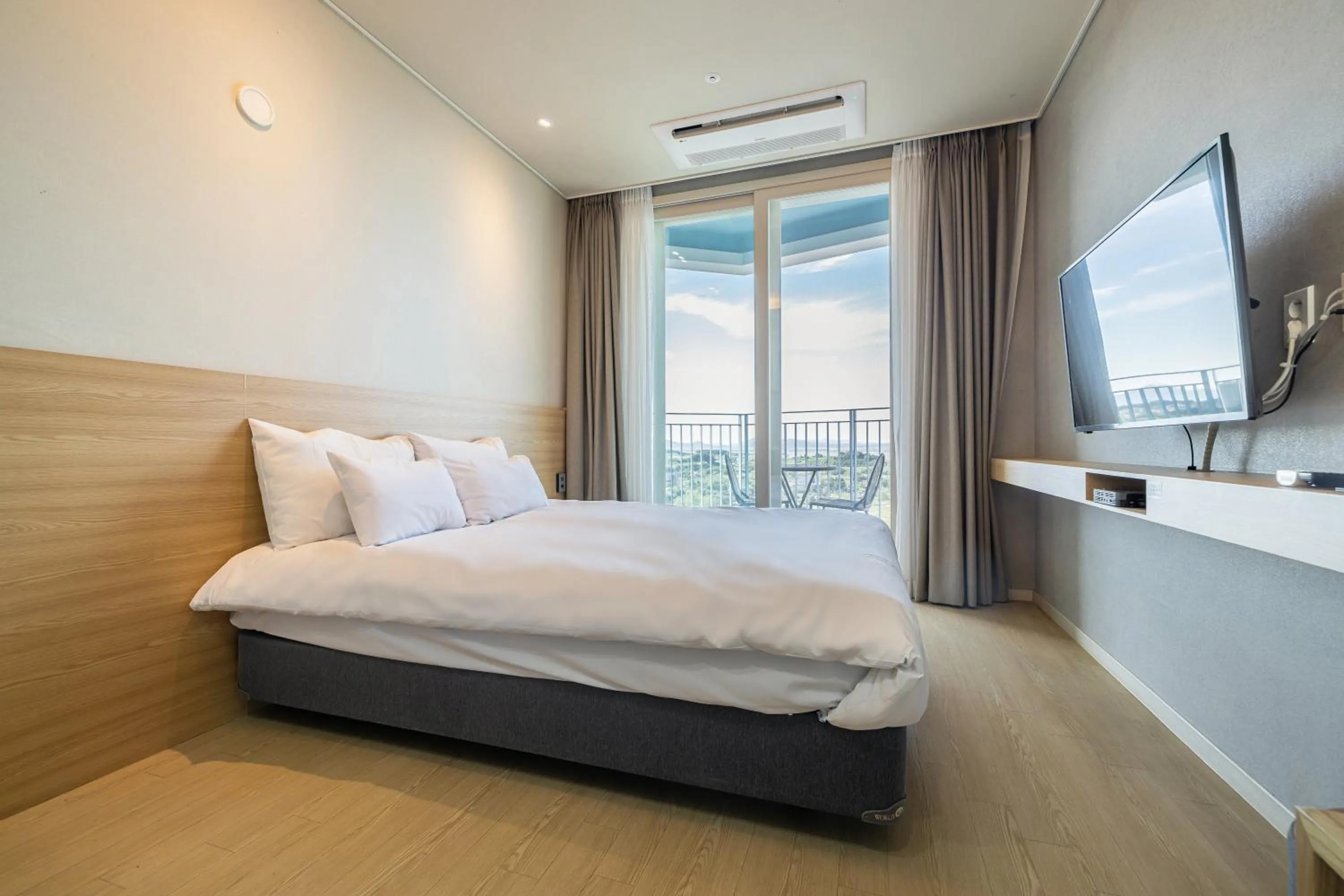 Bed in Ocean Soleview Hotel