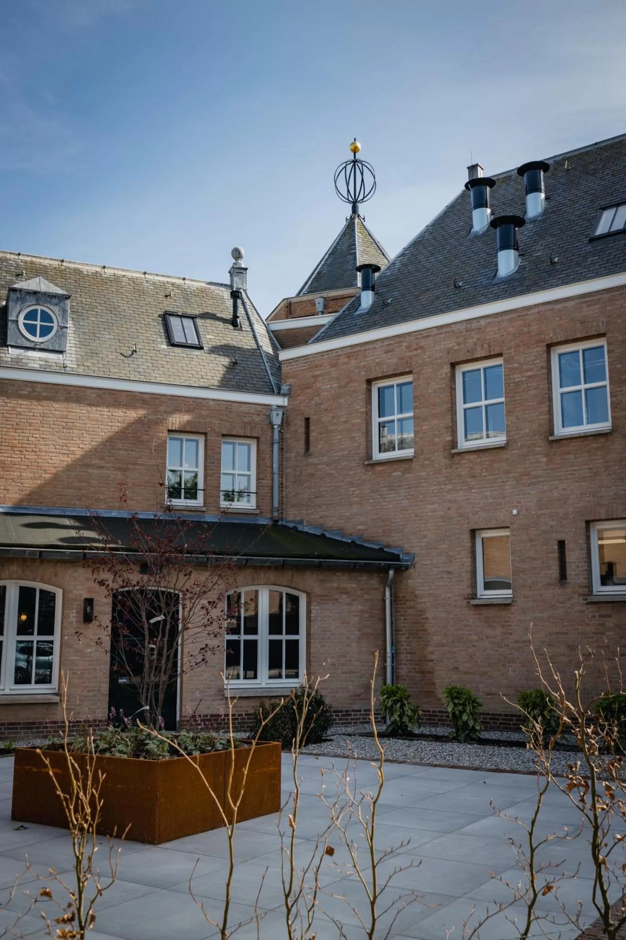 Property building, Winter in Hotel St Joris I Kloeg Collection