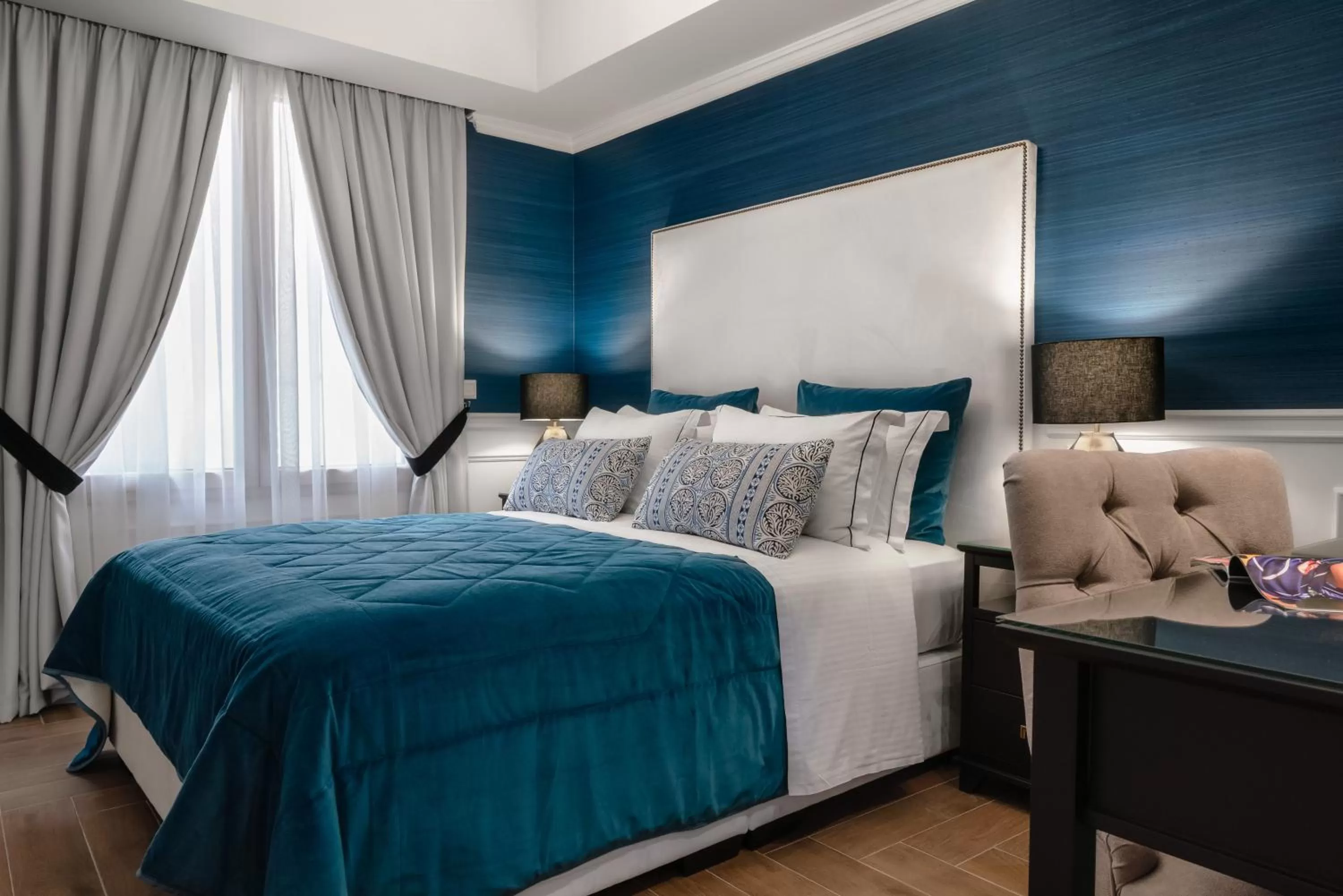 Bed in Evripidou Suites