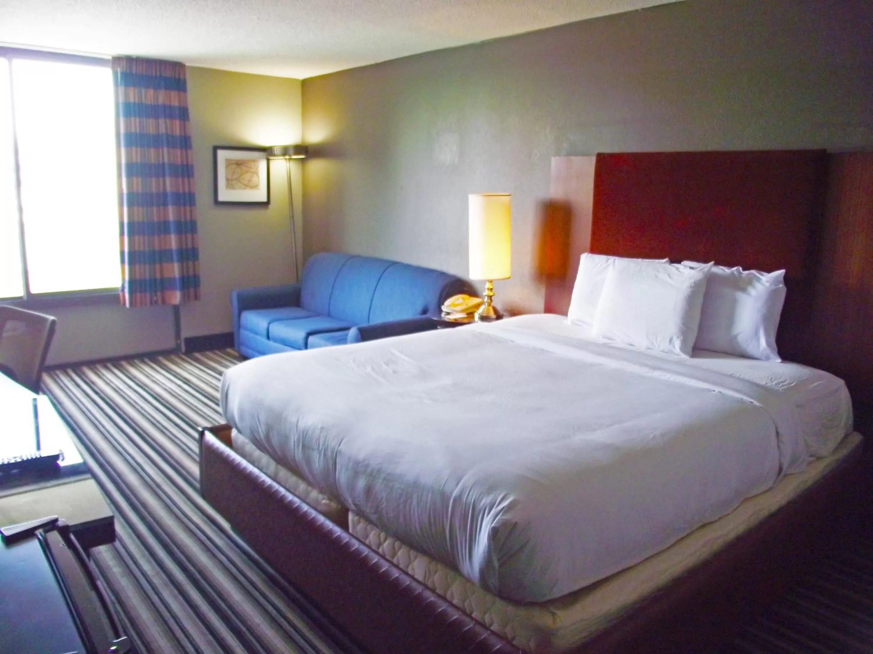 Bed in Travelodge by Wyndham Memphis Airport/Graceland