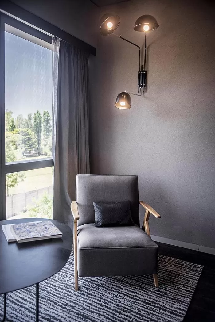 Seating area in KOS Pilar Hotel