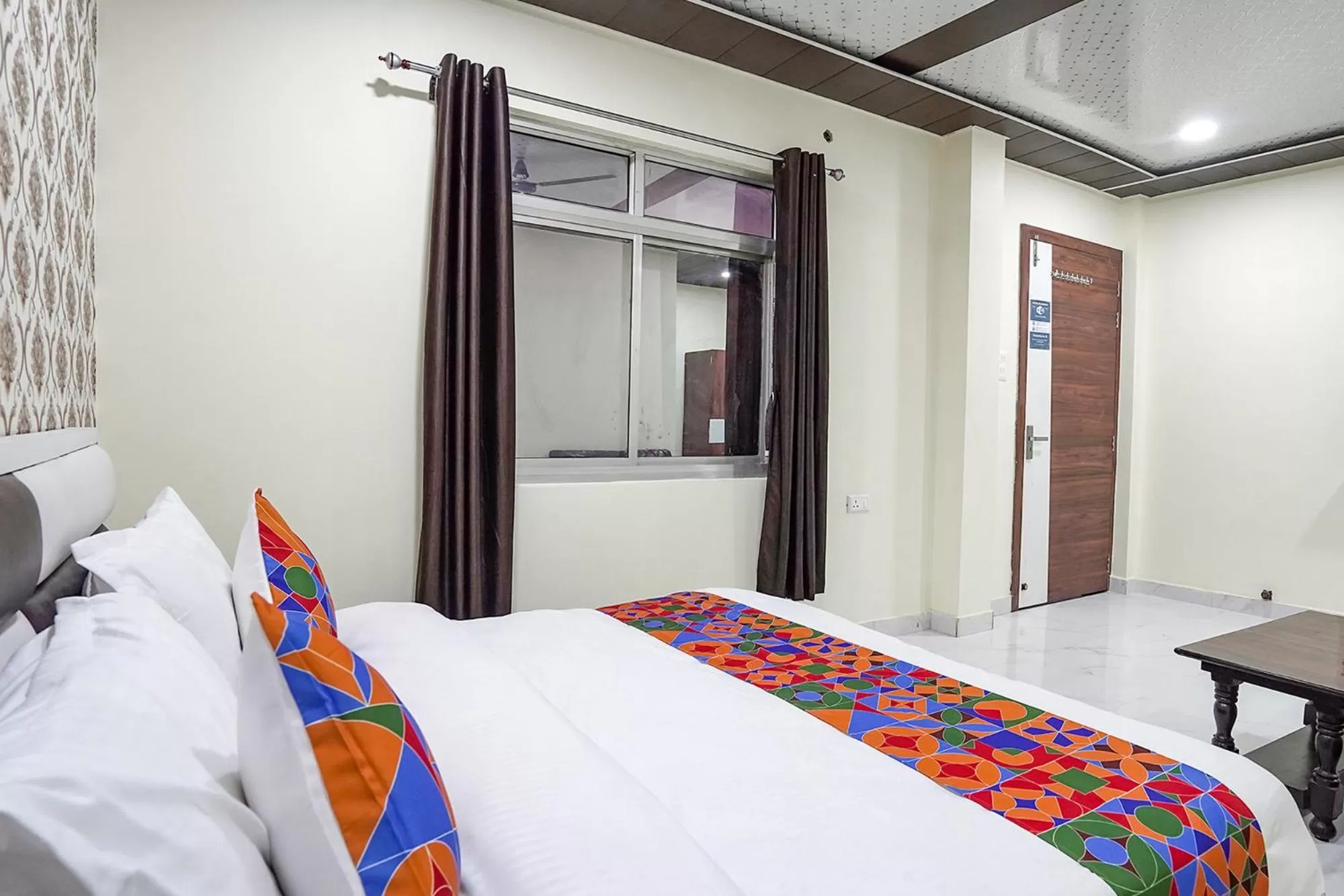 Bed in FabHotel Rajdhani