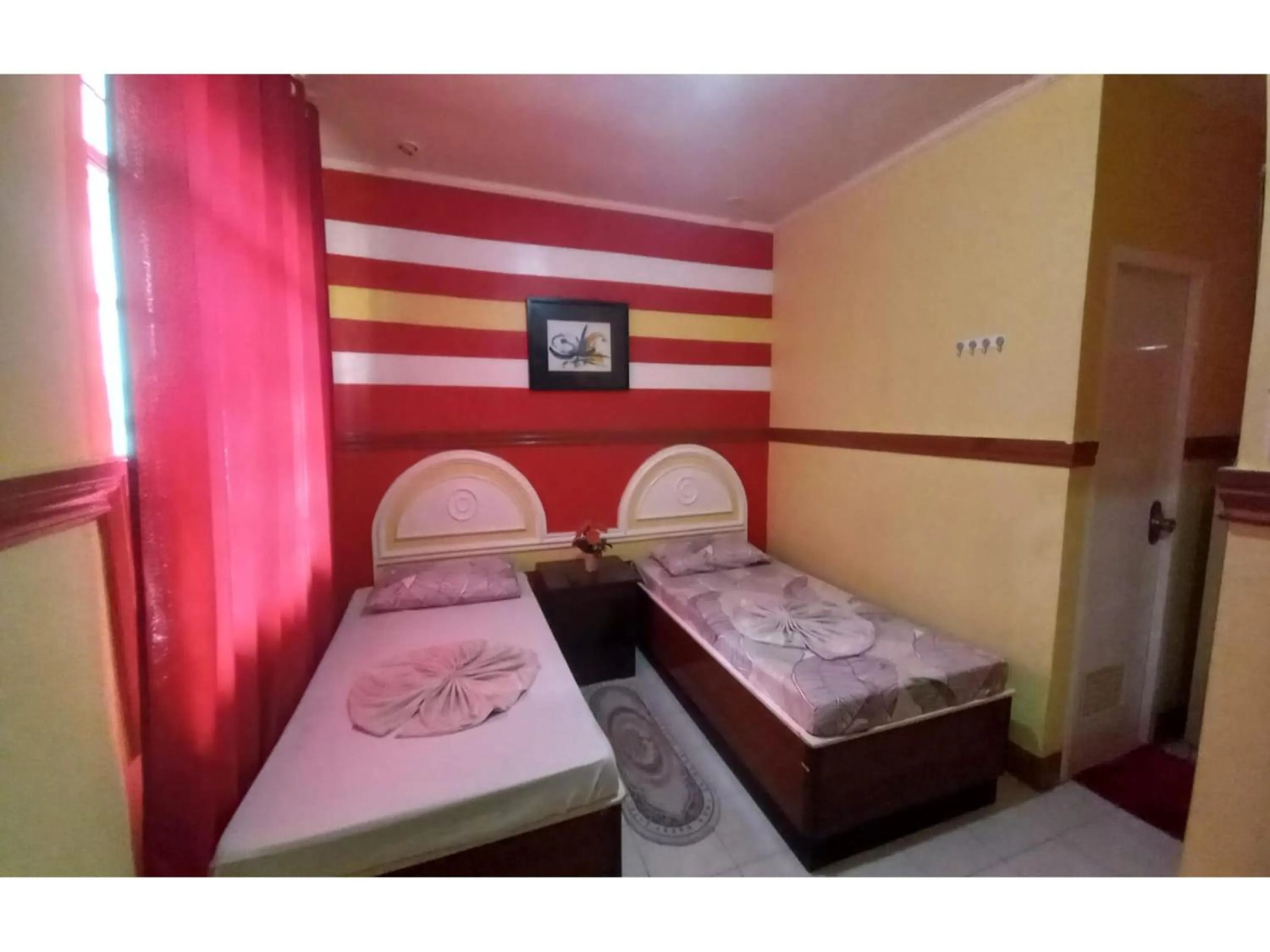 Deluxe Twin Room in OYO 1048 Jomckayl Apartelle