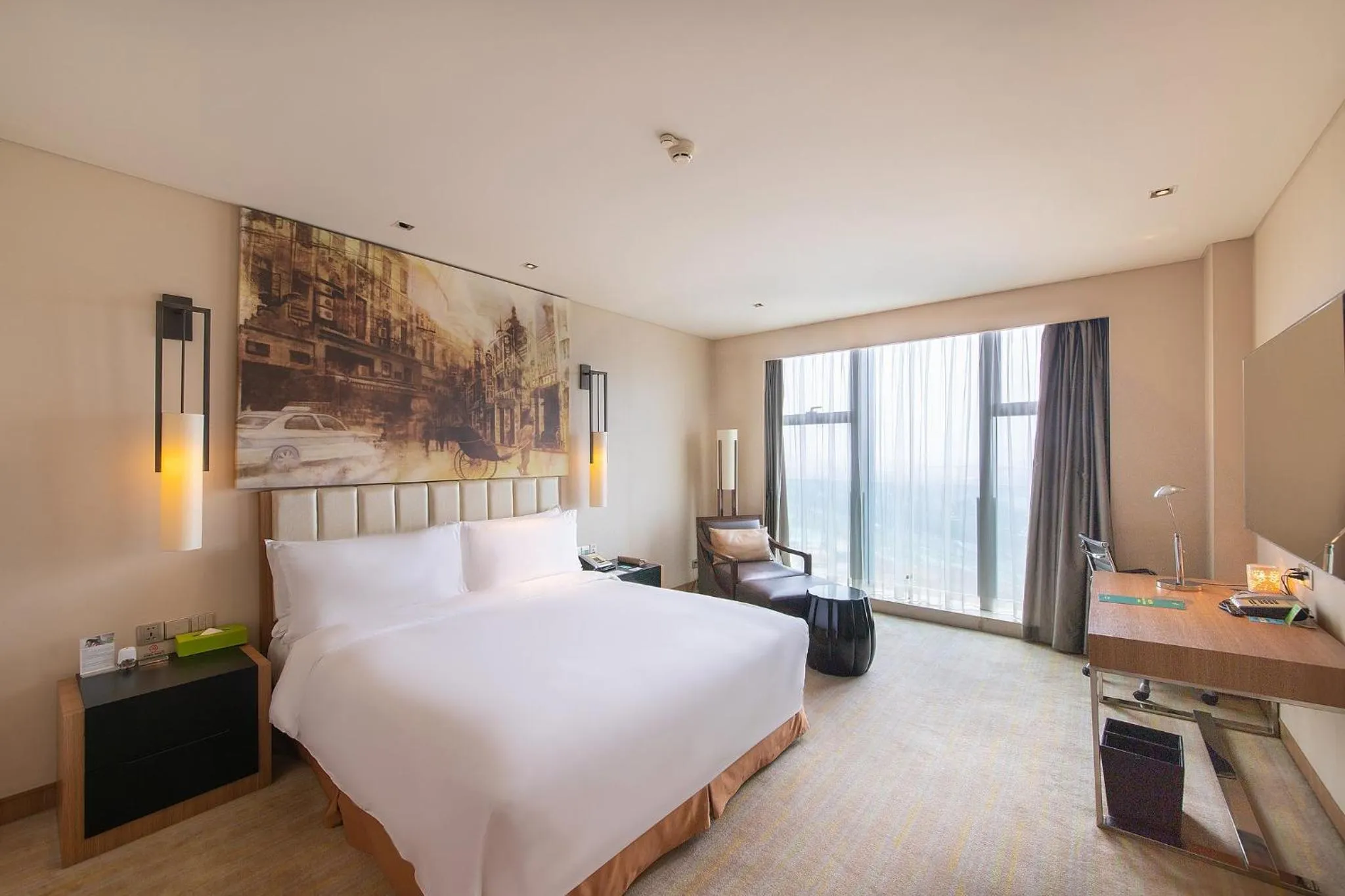 Photo of the whole room in Junluxe Hotel Guangzhou Science City-Free Shuttle Bus Service to Guangzhou Canton Fair