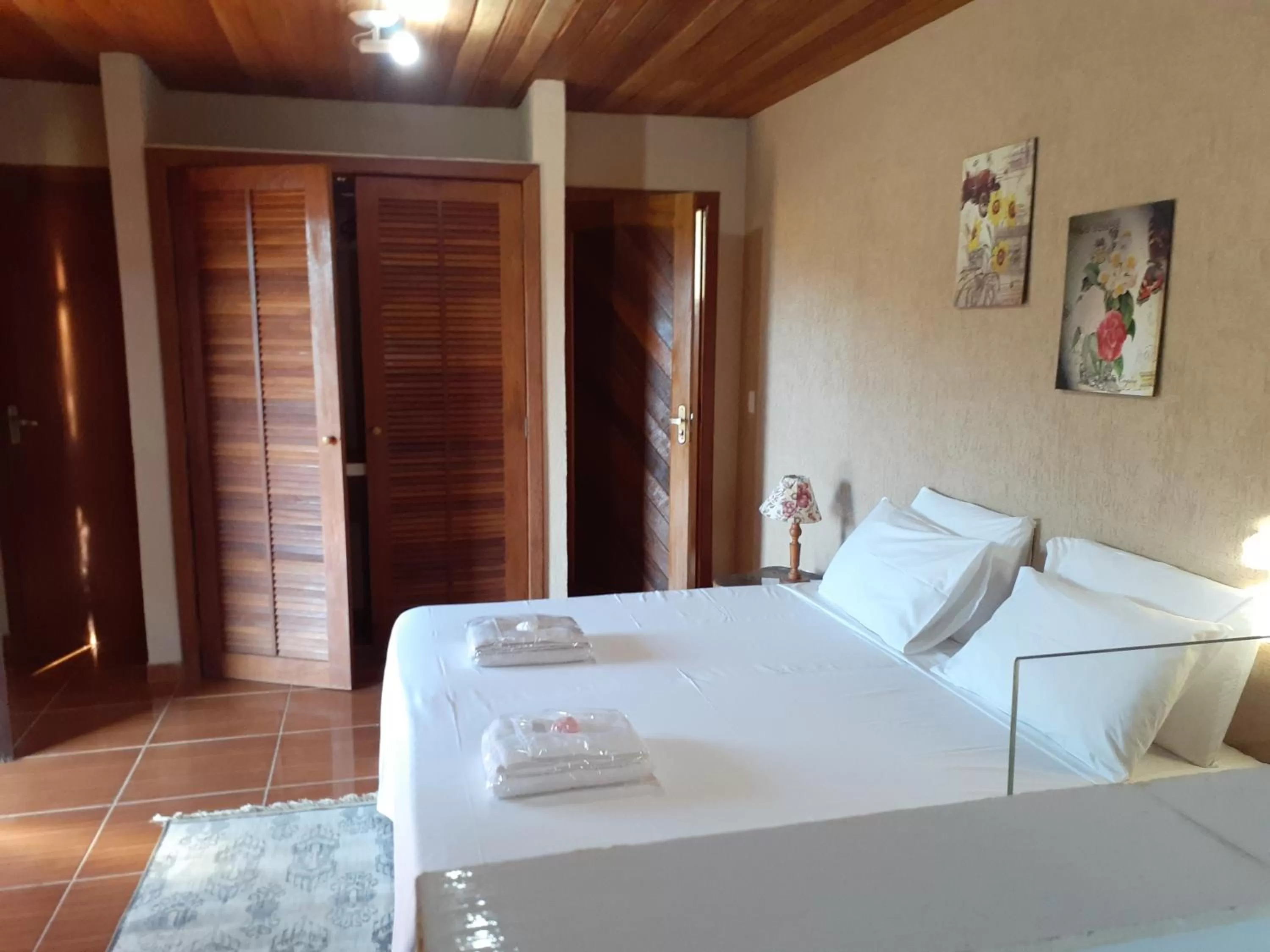 Bed in Pousada R.N.C. Nosso Paraíso