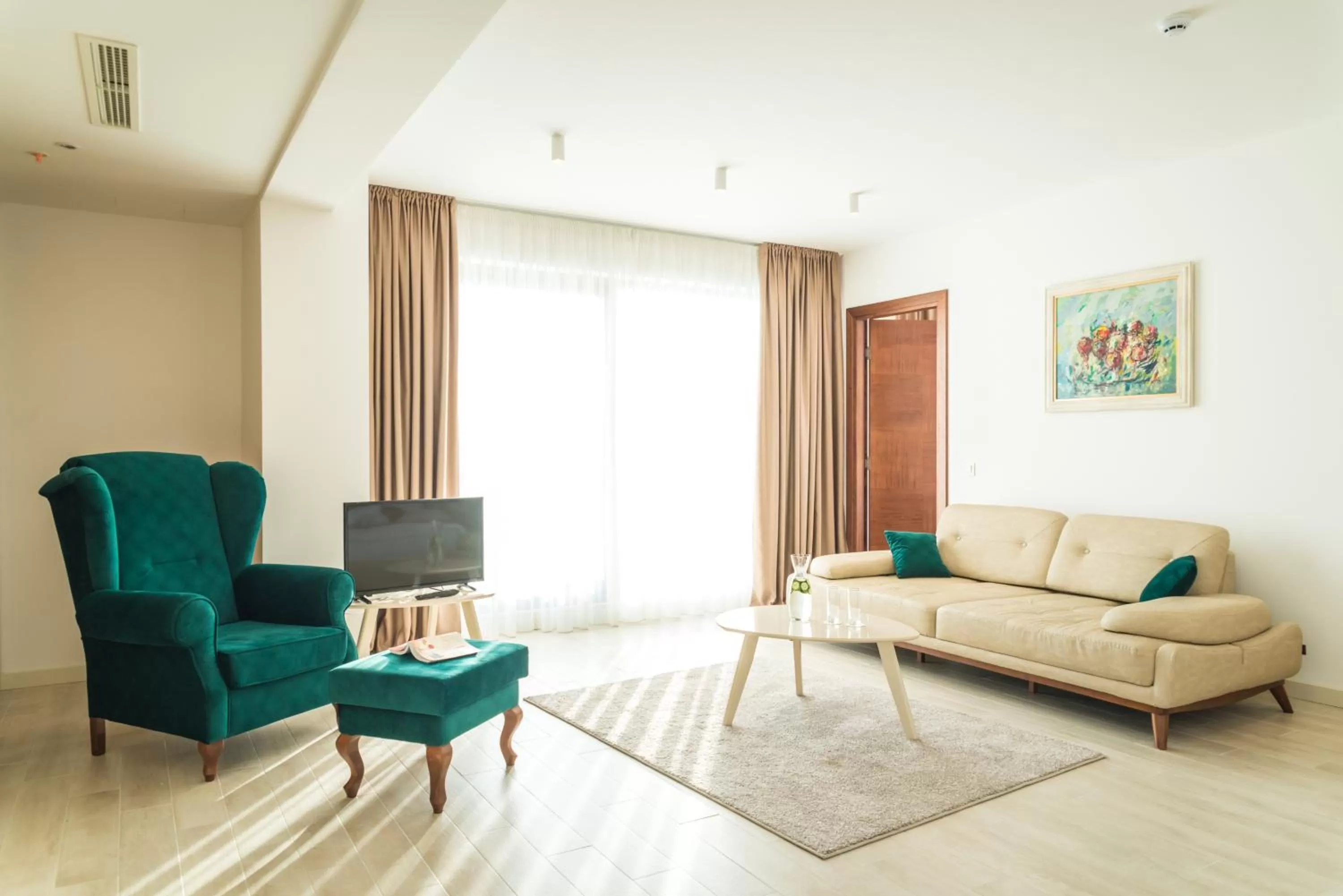 Living room in Hotel Kadmo by Aycon